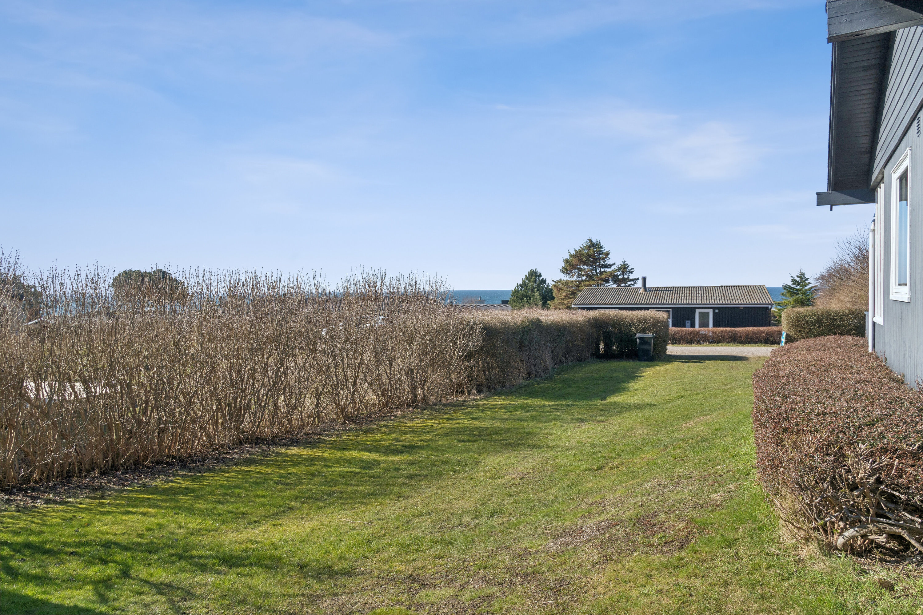 Fremhævet set fra haven billede i fuldskærmstilstand. Billede af Hjorthøjgårdsvej 14, Svallerup, 4400 Kalundborg