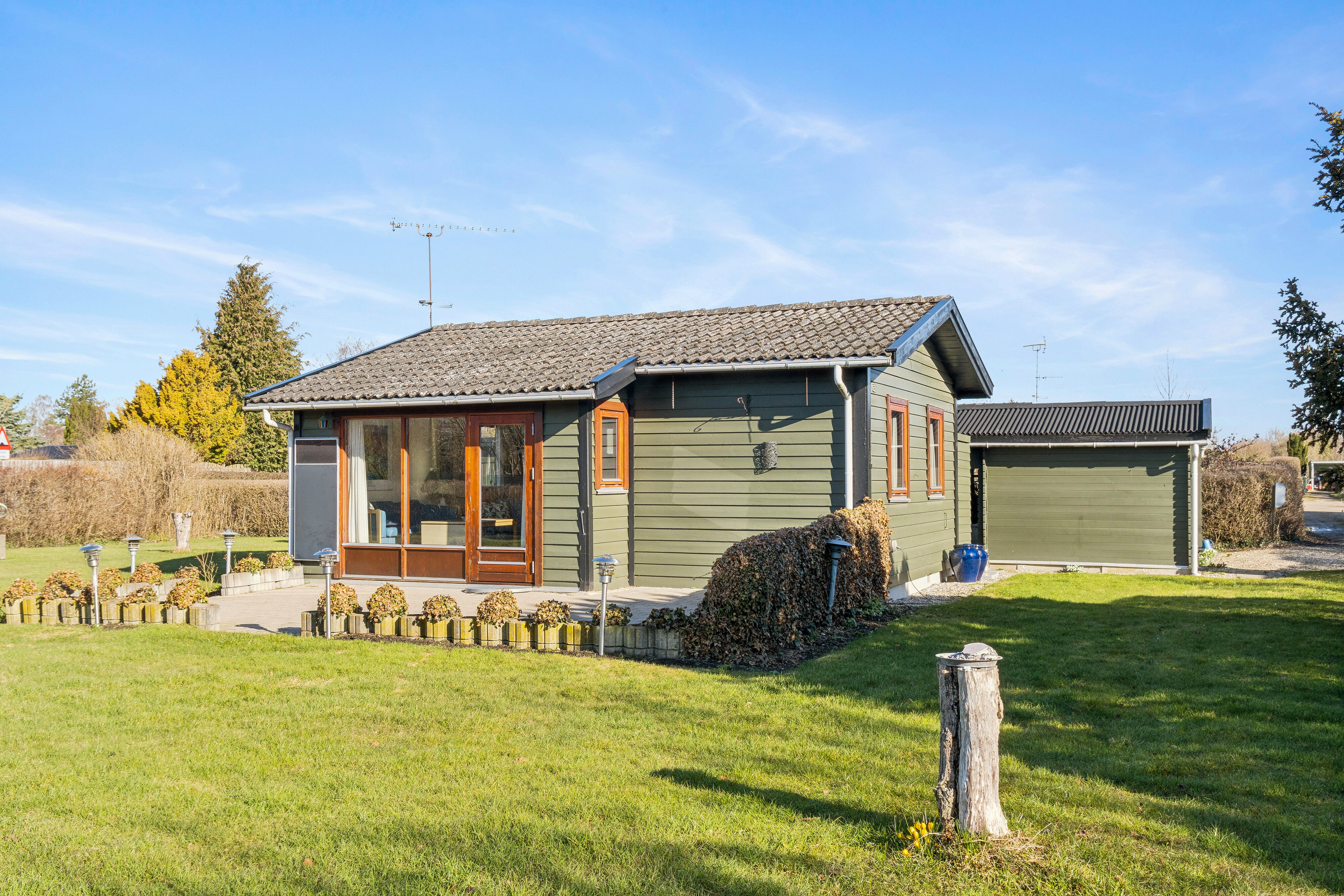 Fremhævet set fra haven billede i fuldskærmstilstand. Billede af Mågevænget 4, Kyndeløse, 4070 Kirke Hyllinge