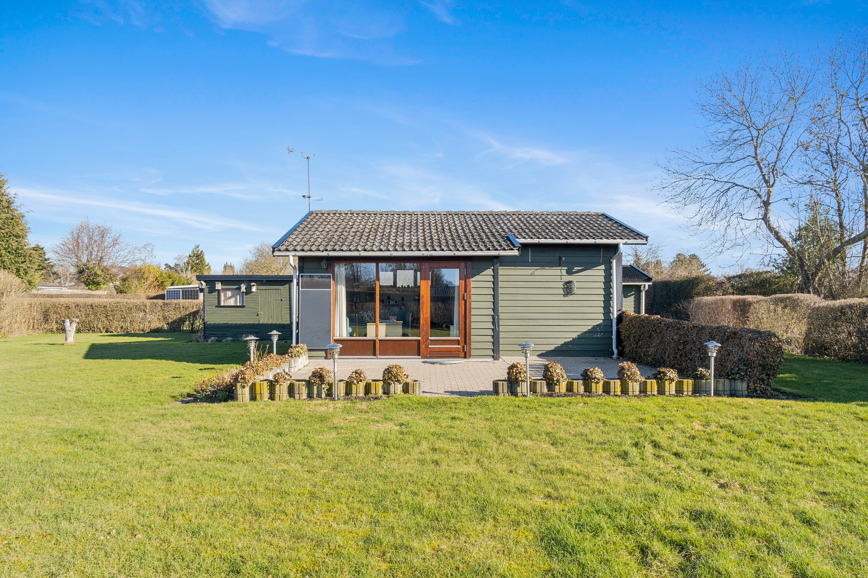 Fremhævet set fra haven billede i fuldskærmstilstand. Billede af Mågevænget 4, Kyndeløse, 4070 Kirke Hyllinge