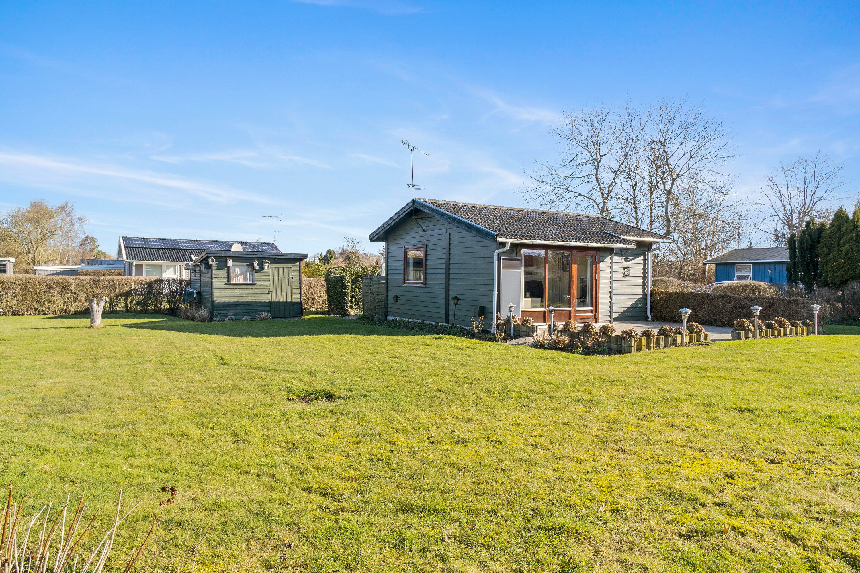 Fremhævet set fra haven billede i fuldskærmstilstand. Billede af Mågevænget 4, Kyndeløse, 4070 Kirke Hyllinge