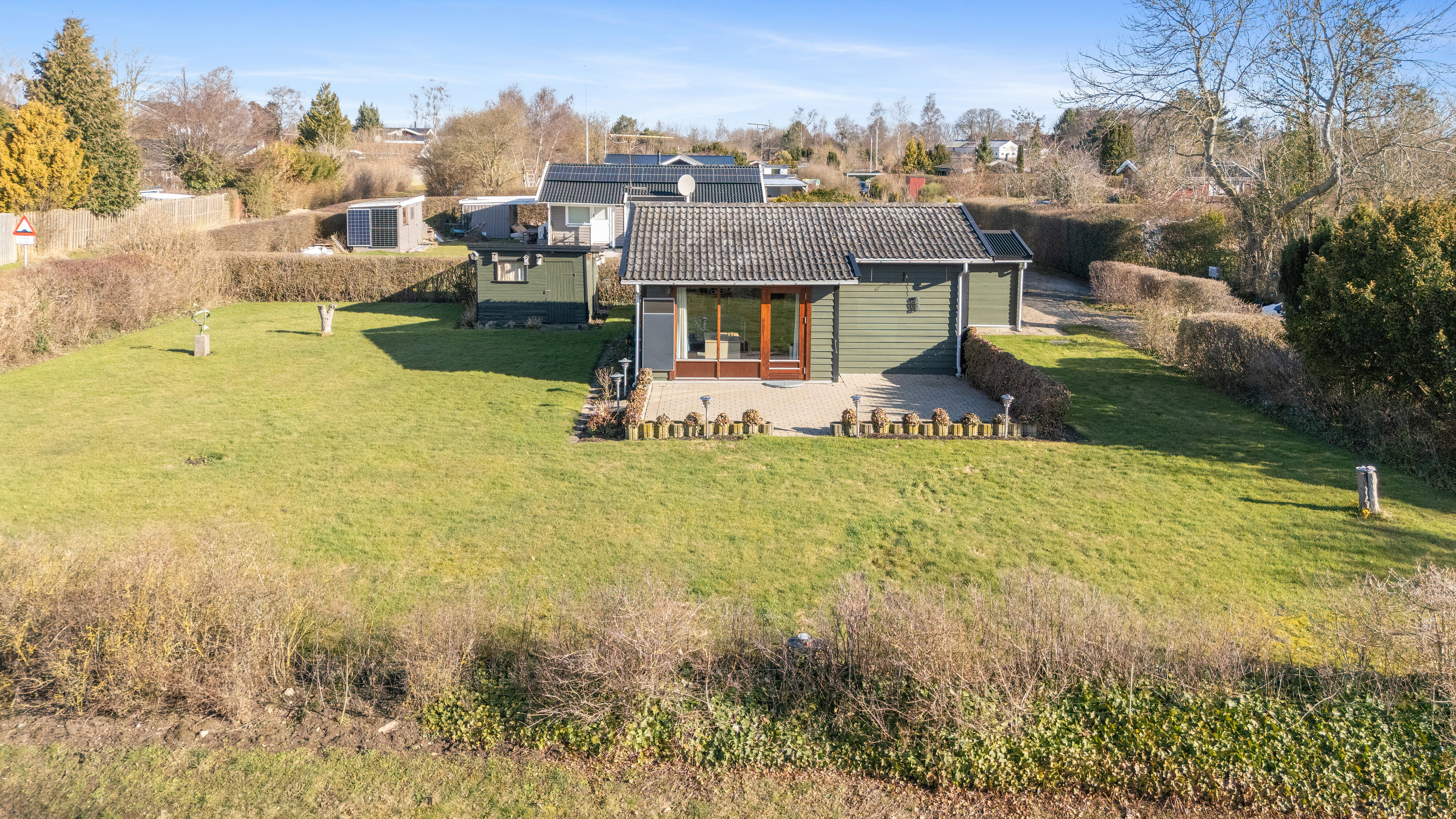 Fremhævet set fra haven billede i fuldskærmstilstand. Billede af Mågevænget 4, Kyndeløse, 4070 Kirke Hyllinge