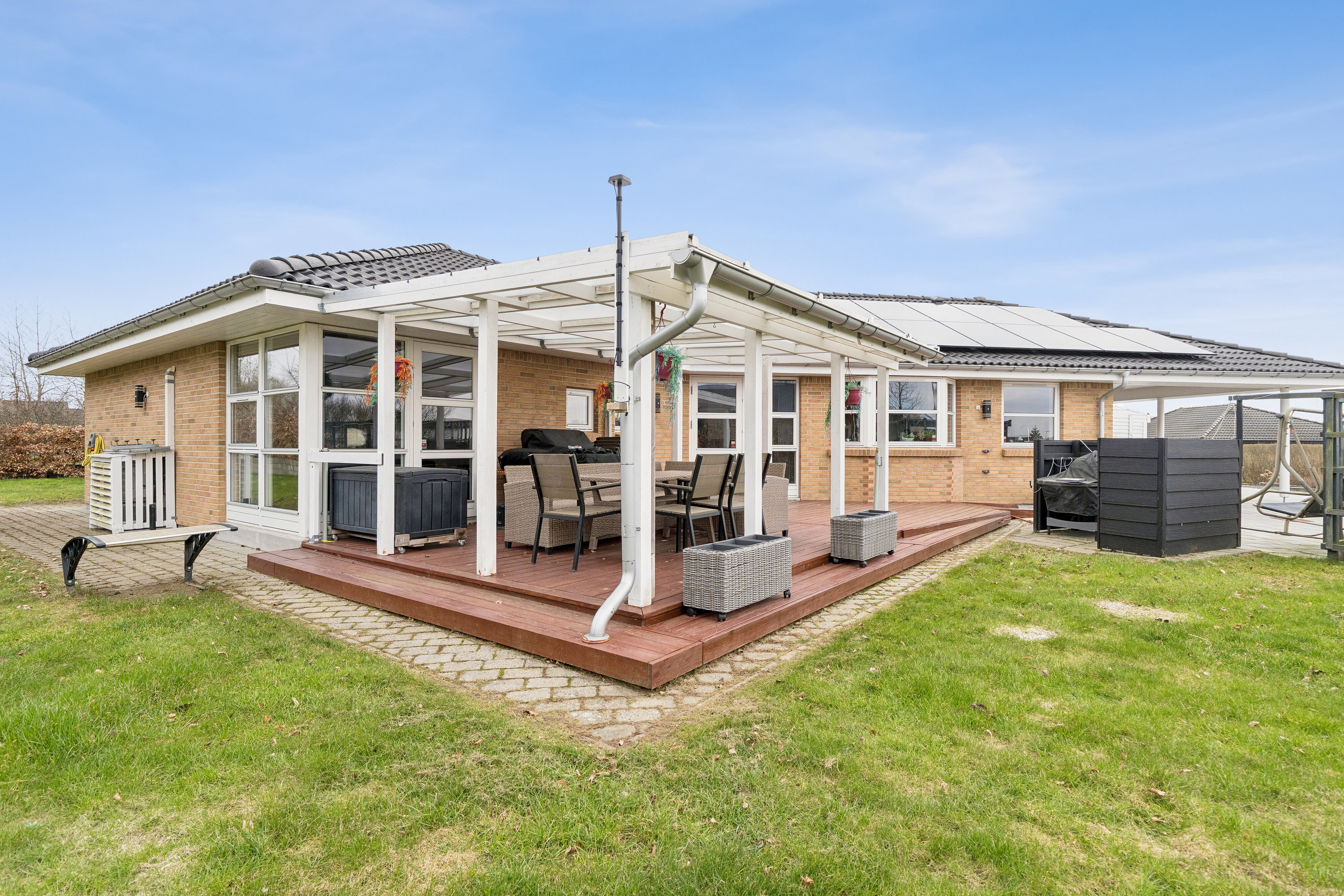 Fremhævet set fra haven billede i fuldskærmstilstand. Billede af Ketting Parkvej 69, 8462 Harlev J