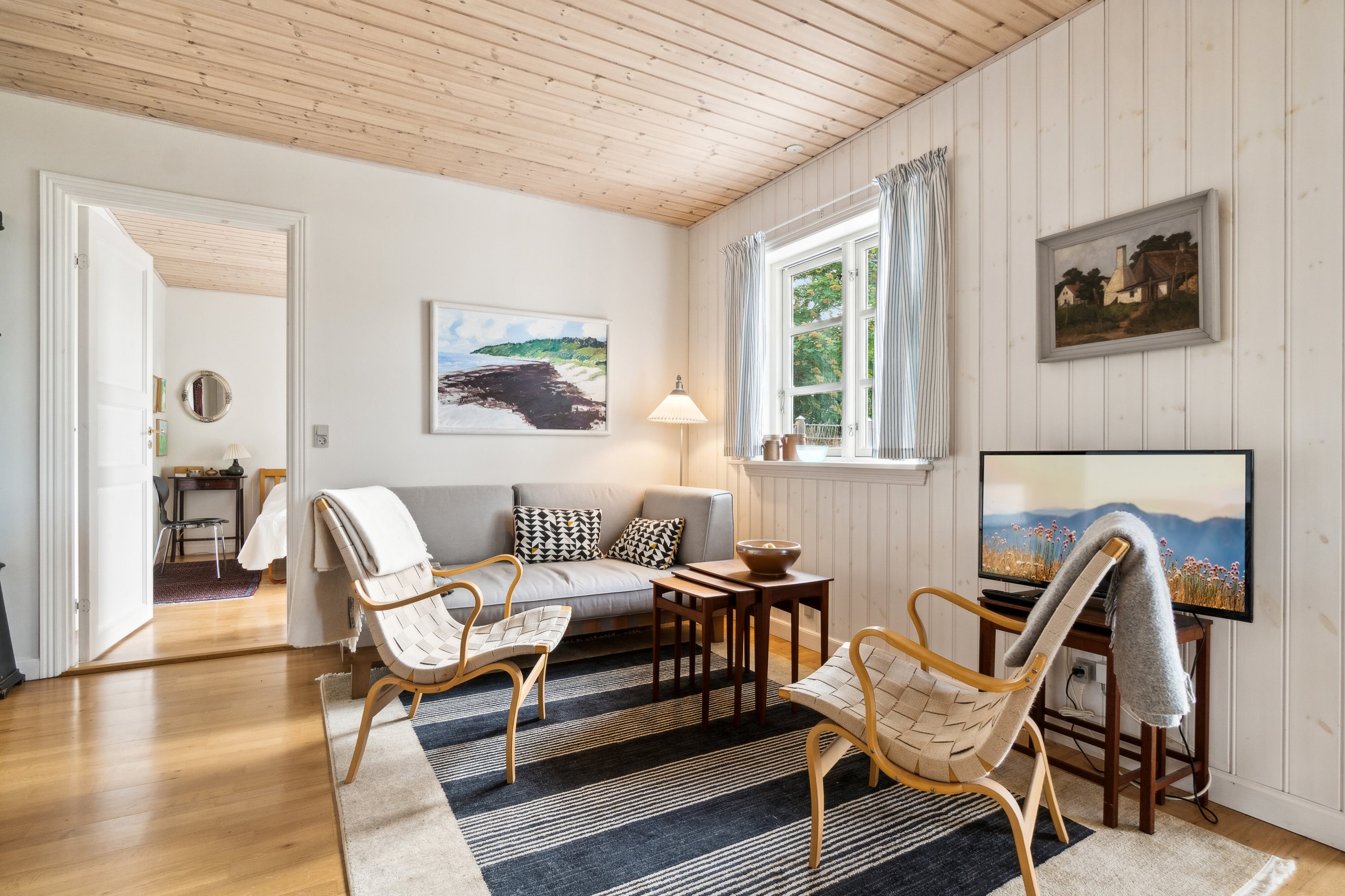 Fremhævet stue billede i fuldskærmstilstand. Billede af Lersøvej 13, 3700 Rønne