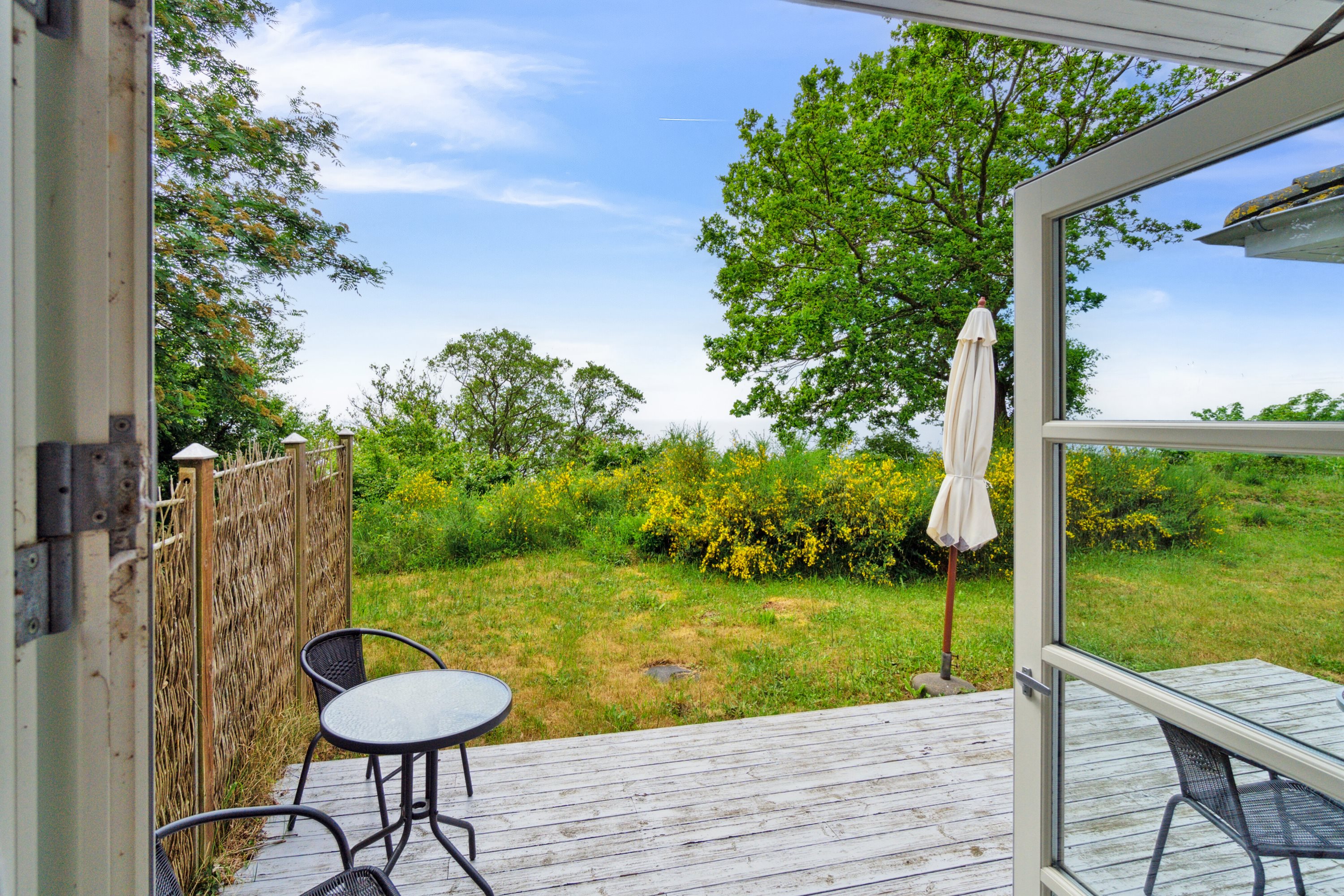 Fremhævet terrasse billede i fuldskærmstilstand. Billede af Lersøvej 13, 3700 Rønne