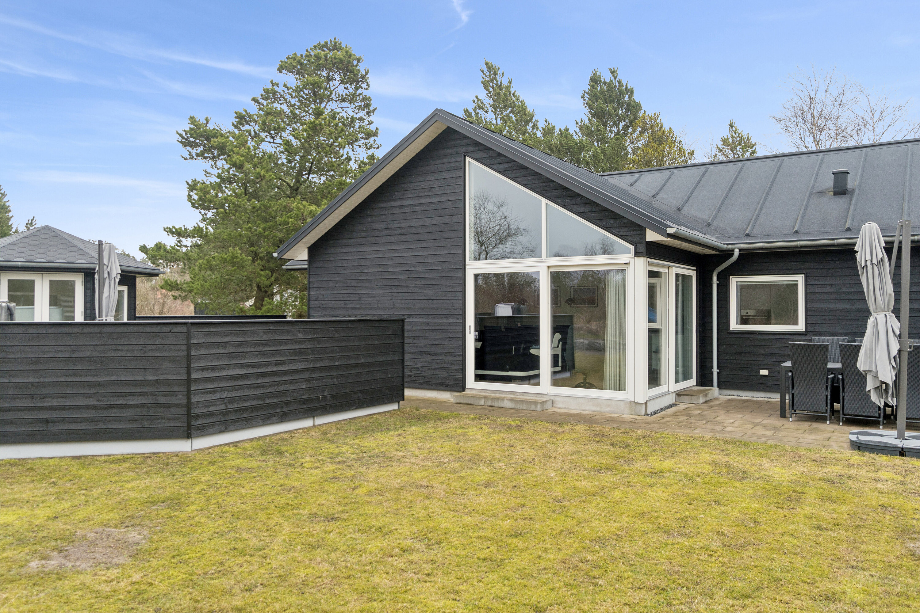 Fremhævet set fra haven billede i fuldskærmstilstand. Billede af Østervej 27, Tversted, 9881 Bindslev