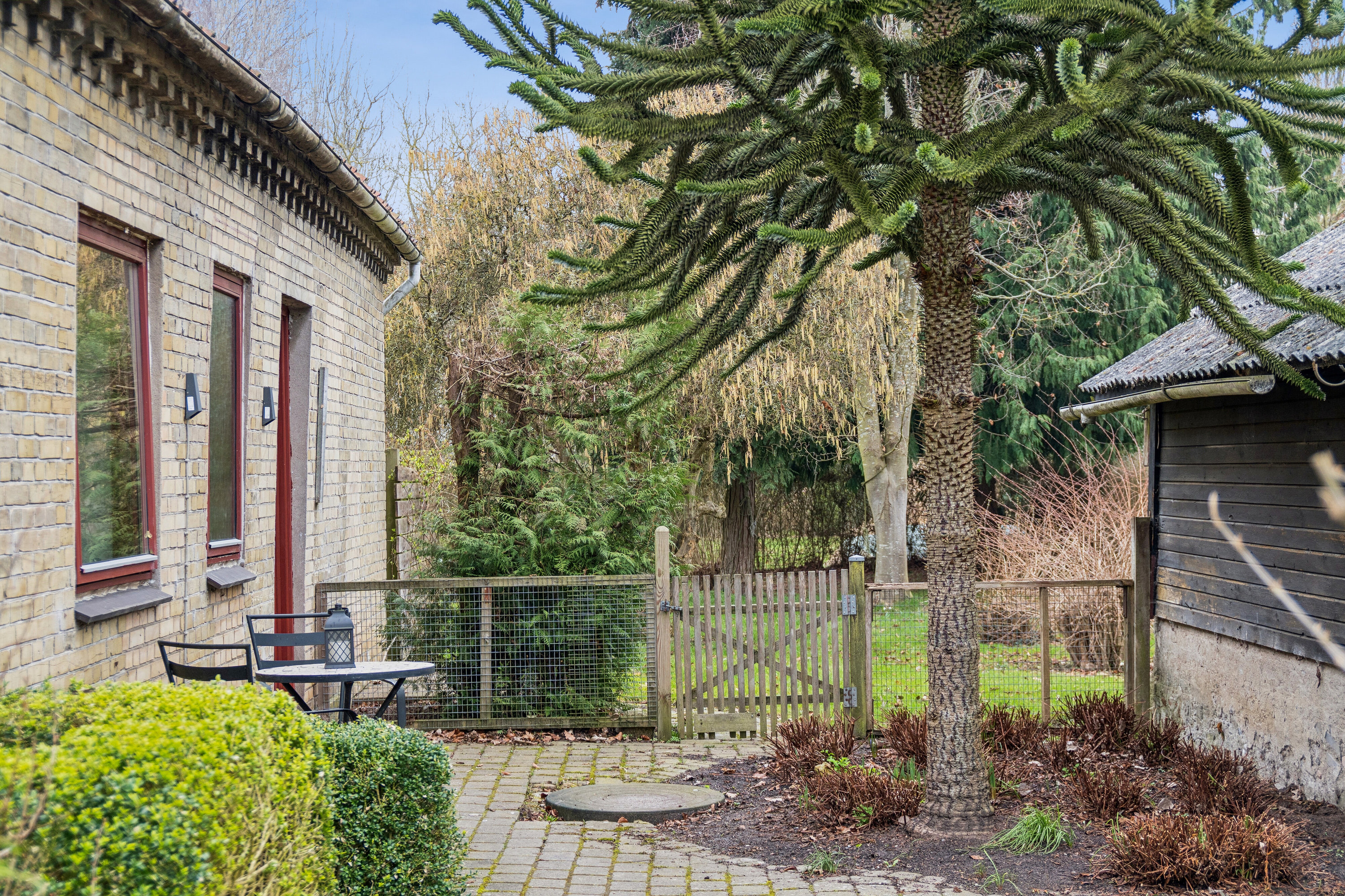 Fremhævet set fra haven billede i fuldskærmstilstand. Billede af Teglværksvej 25 A og B, Revninge, 5300 Kerteminde