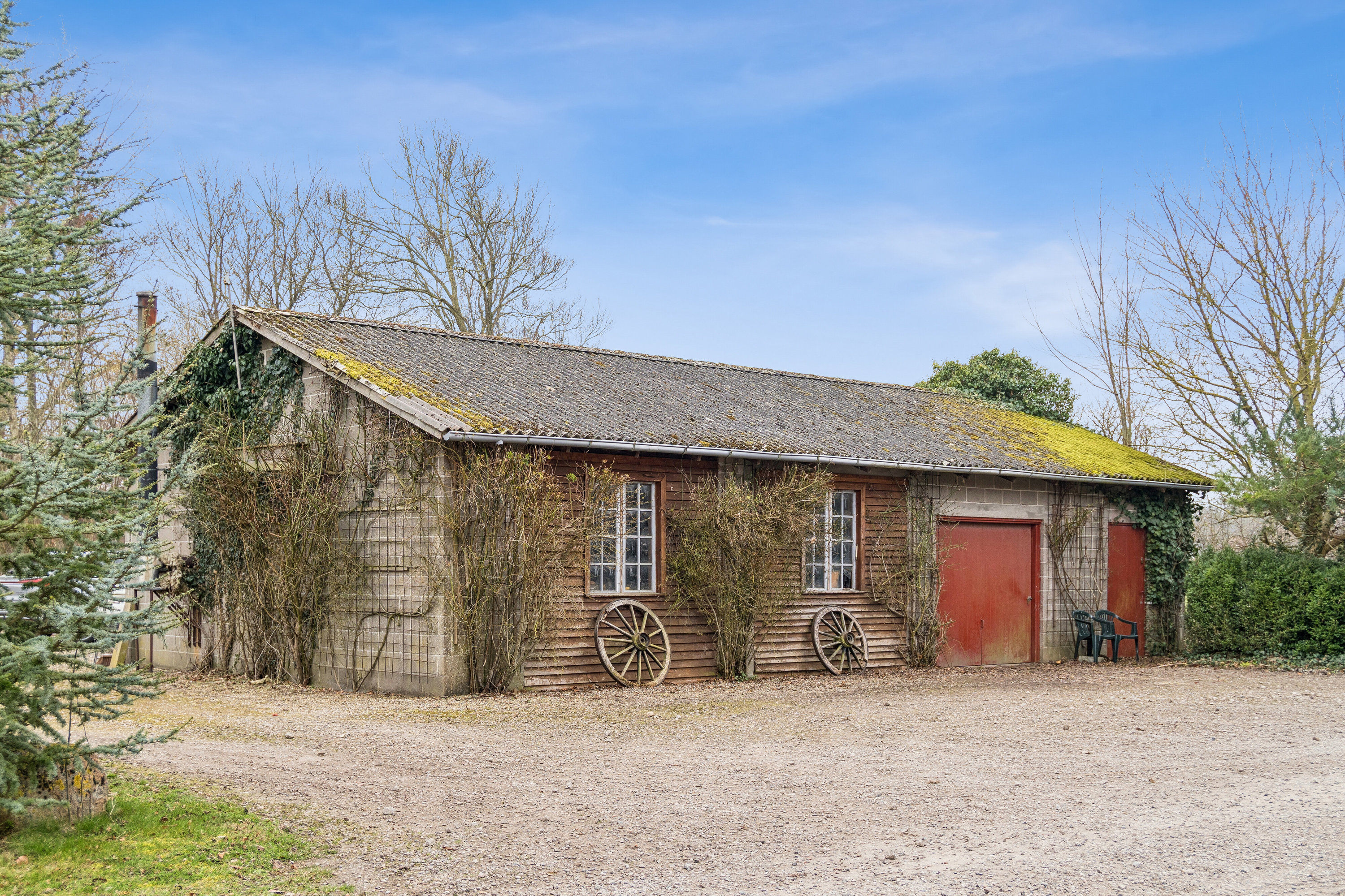Fremhævet set fra vejen billede i fuldskærmstilstand. Billede af Teglværksvej 25 A og B, Revninge, 5300 Kerteminde