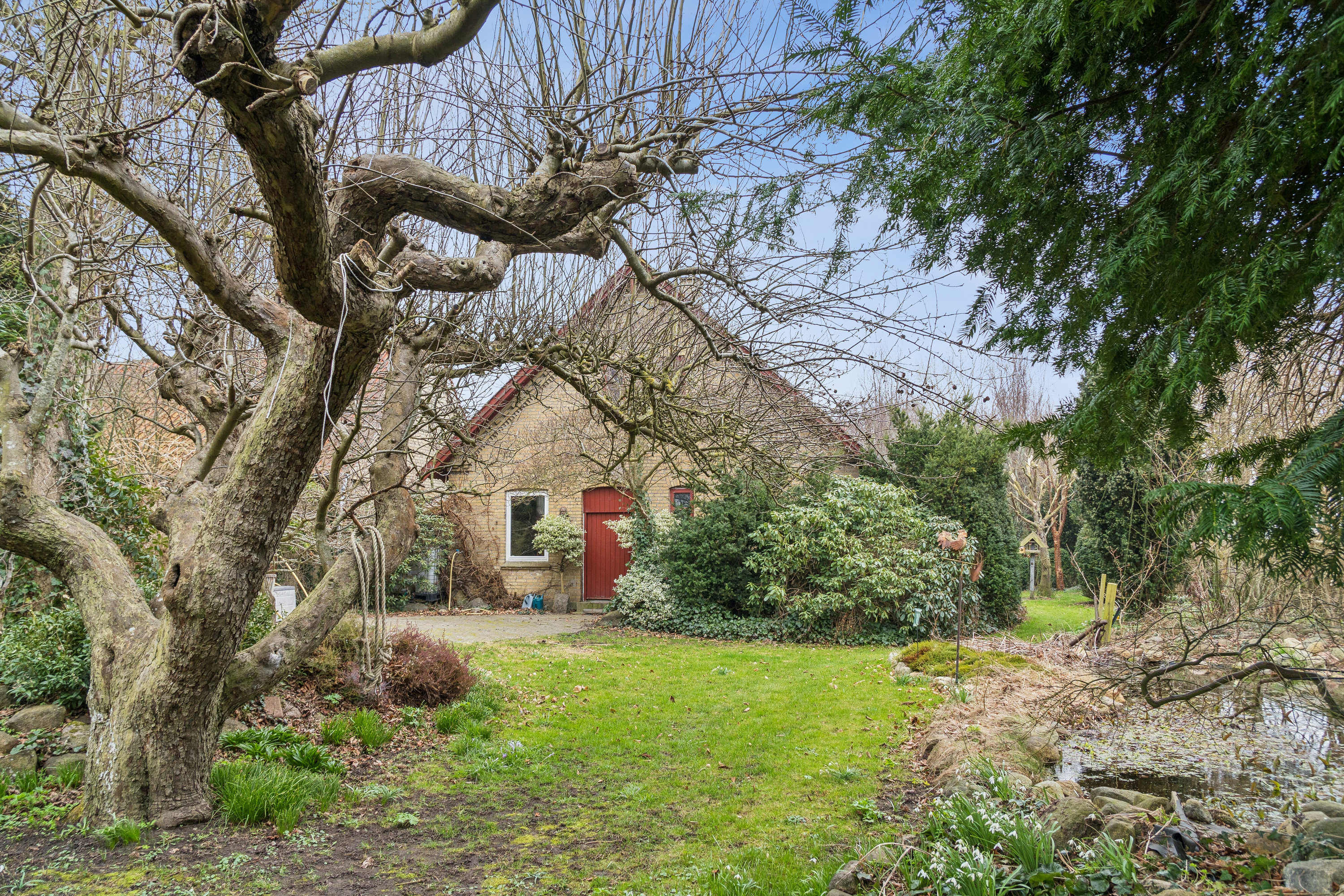 Fremhævet set fra haven billede i fuldskærmstilstand. Billede af Teglværksvej 25 A og B, Revninge, 5300 Kerteminde