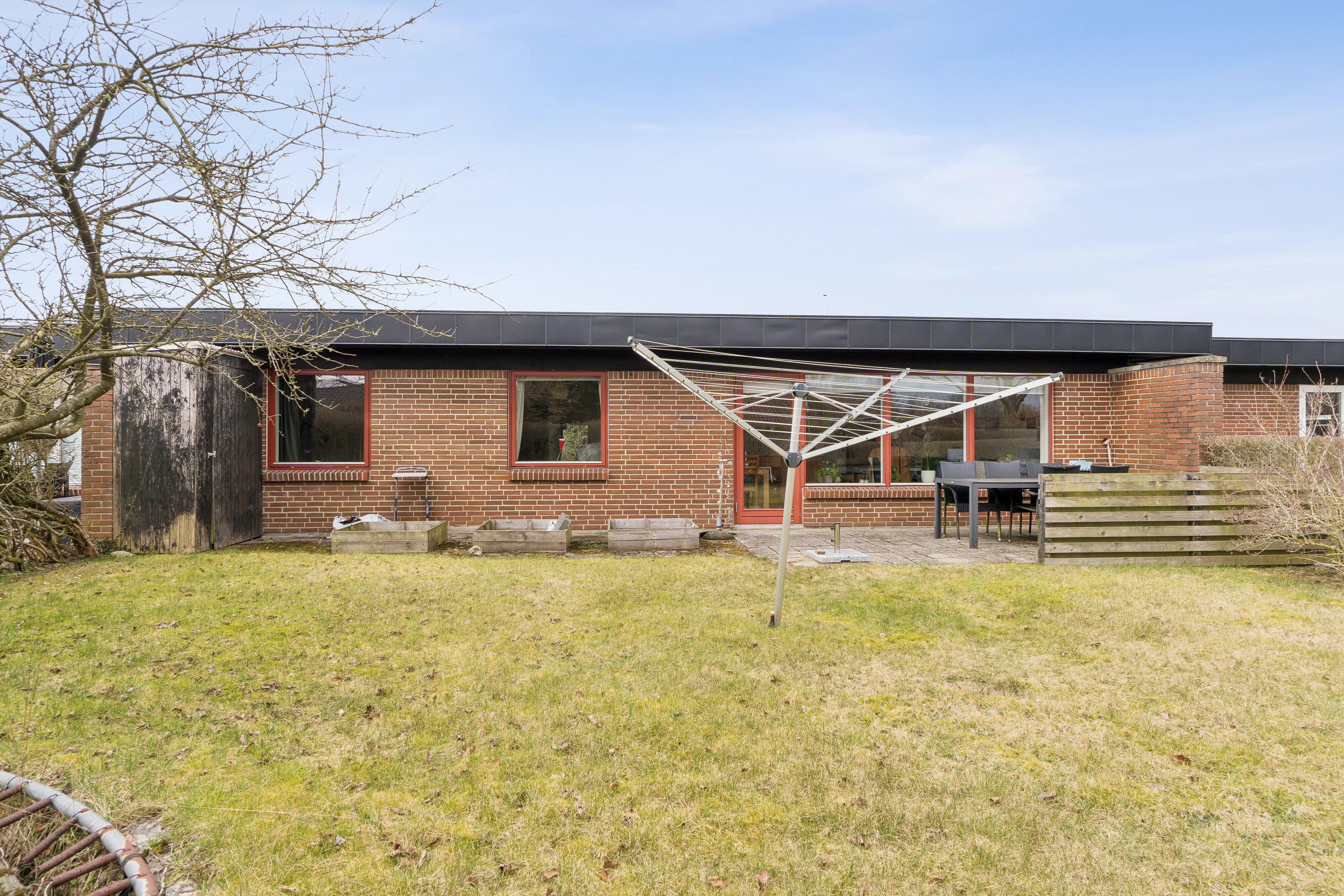 Fremhævet set fra haven billede i fuldskærmstilstand. Billede af Dalsvinget 18G, 7200 Grindsted