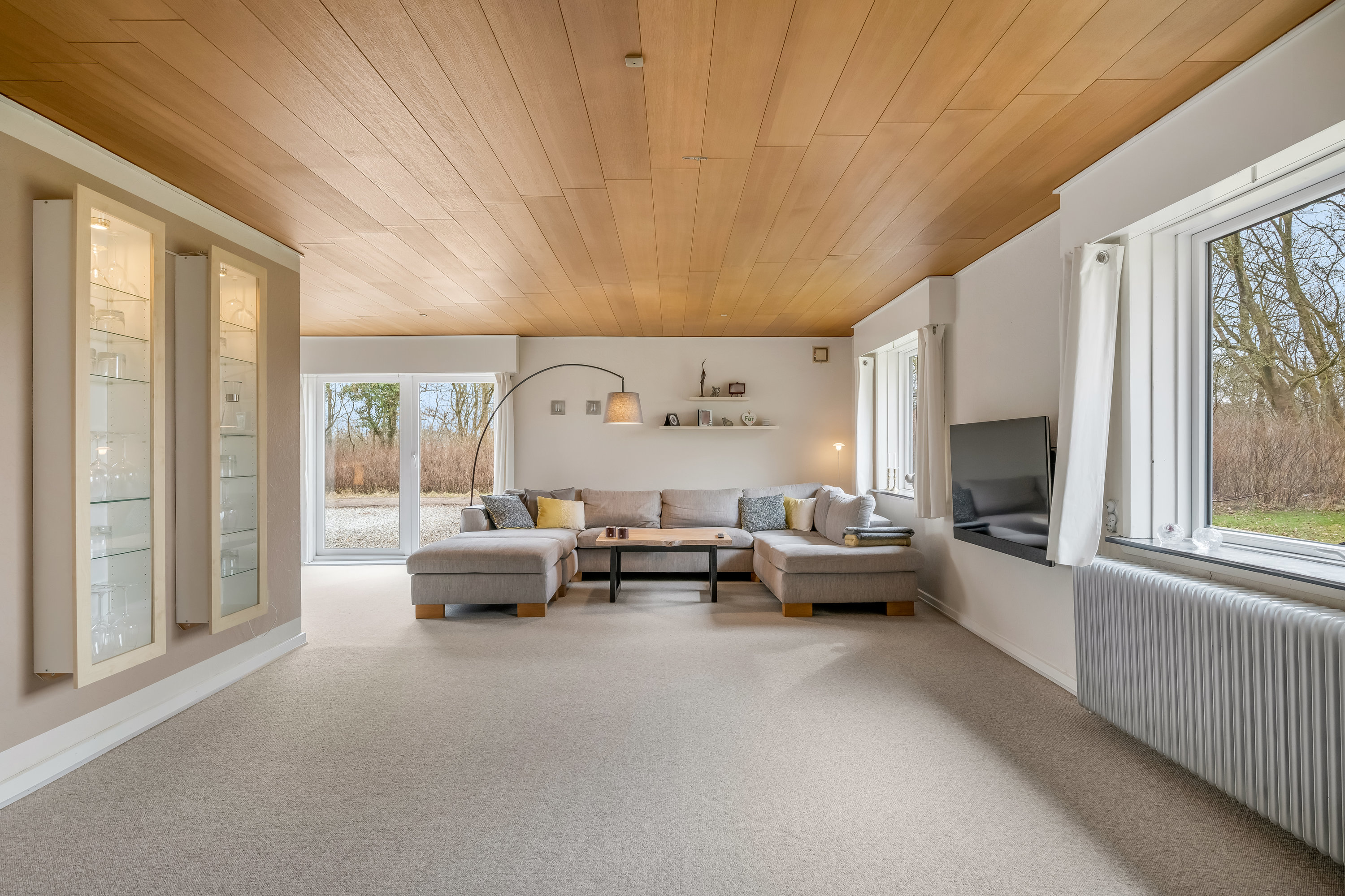 Fremhævet stue billede i fuldskærmstilstand. Billede af Astrupvej 1, Hee, 6950 Ringkøbing