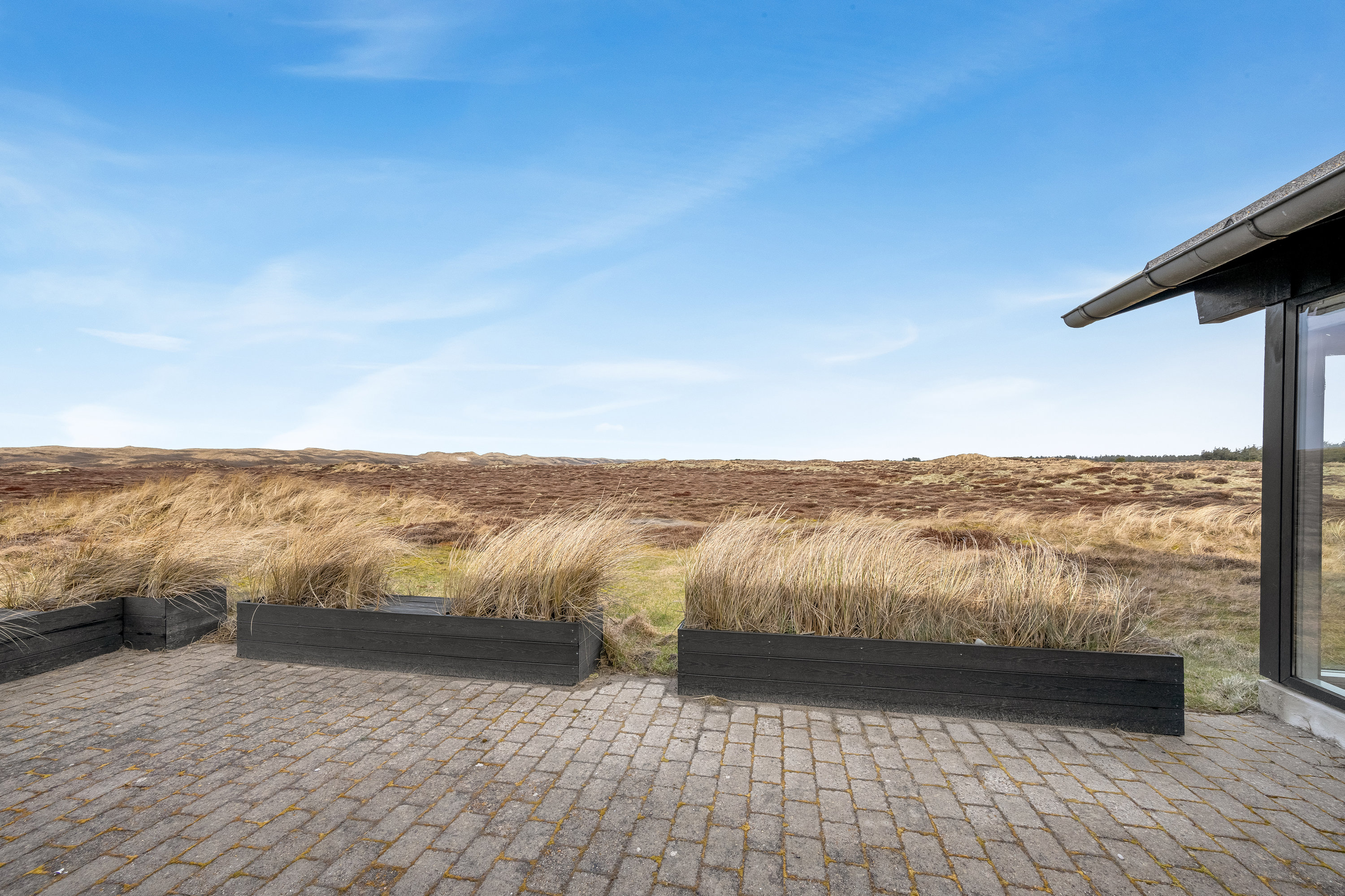 Fremhævet altan billede i fuldskærmstilstand. Billede af Arvidvej 62, Bjerregaard, 6960 Hvide Sande