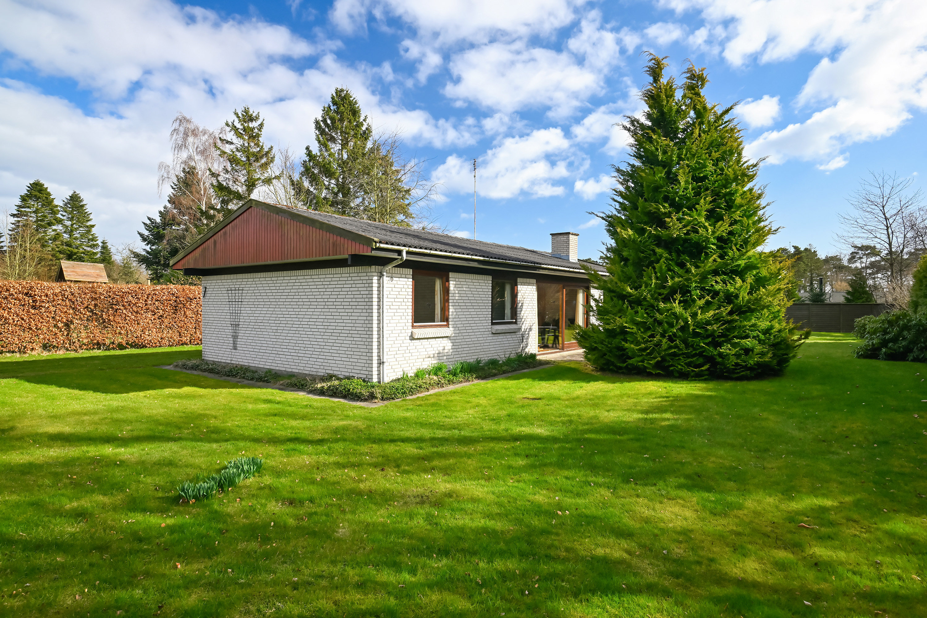 Fremhævet facade billede i fuldskærmstilstand. Billede af Gøgevænget 7, Elkenøre, 4872 Idestrup