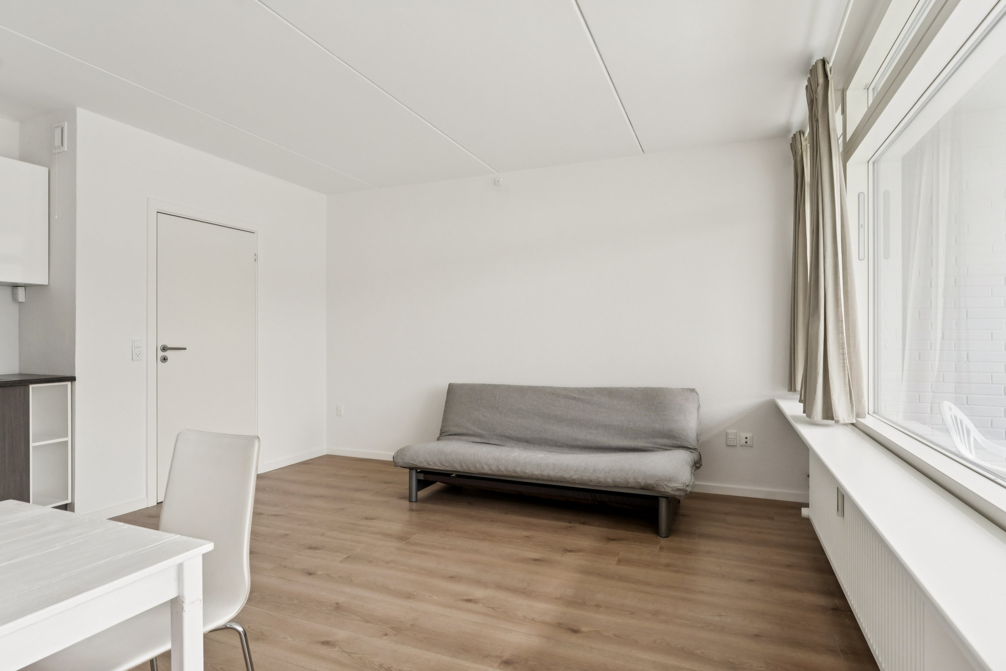 Fremhævet stue billede i fuldskærmstilstand. Billede af Mølletoften 16, st.. mf., 8940 Randers SV