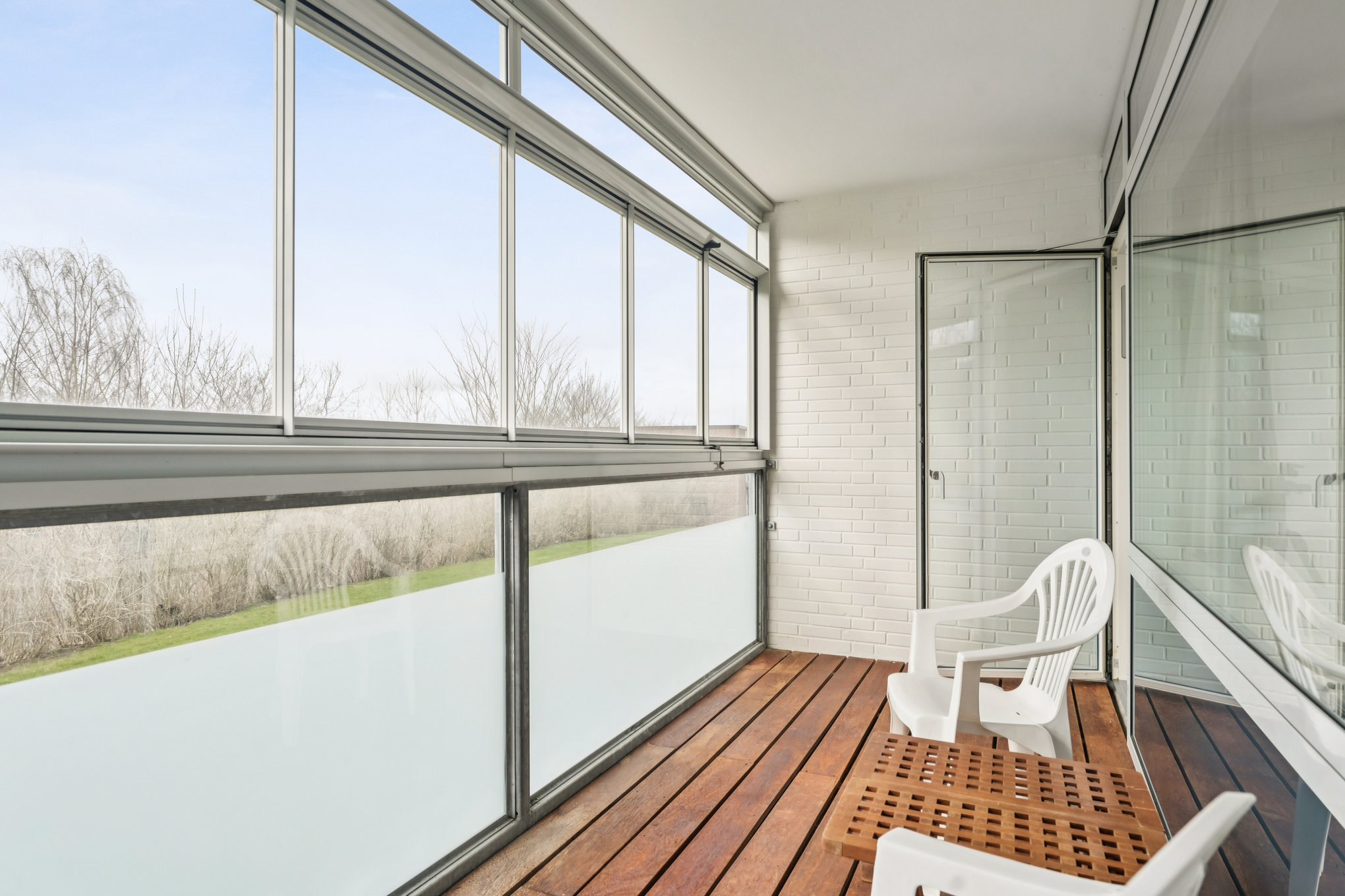 Fremhævet altan billede i fuldskærmstilstand. Billede af Mølletoften 16, st.. mf., 8940 Randers SV