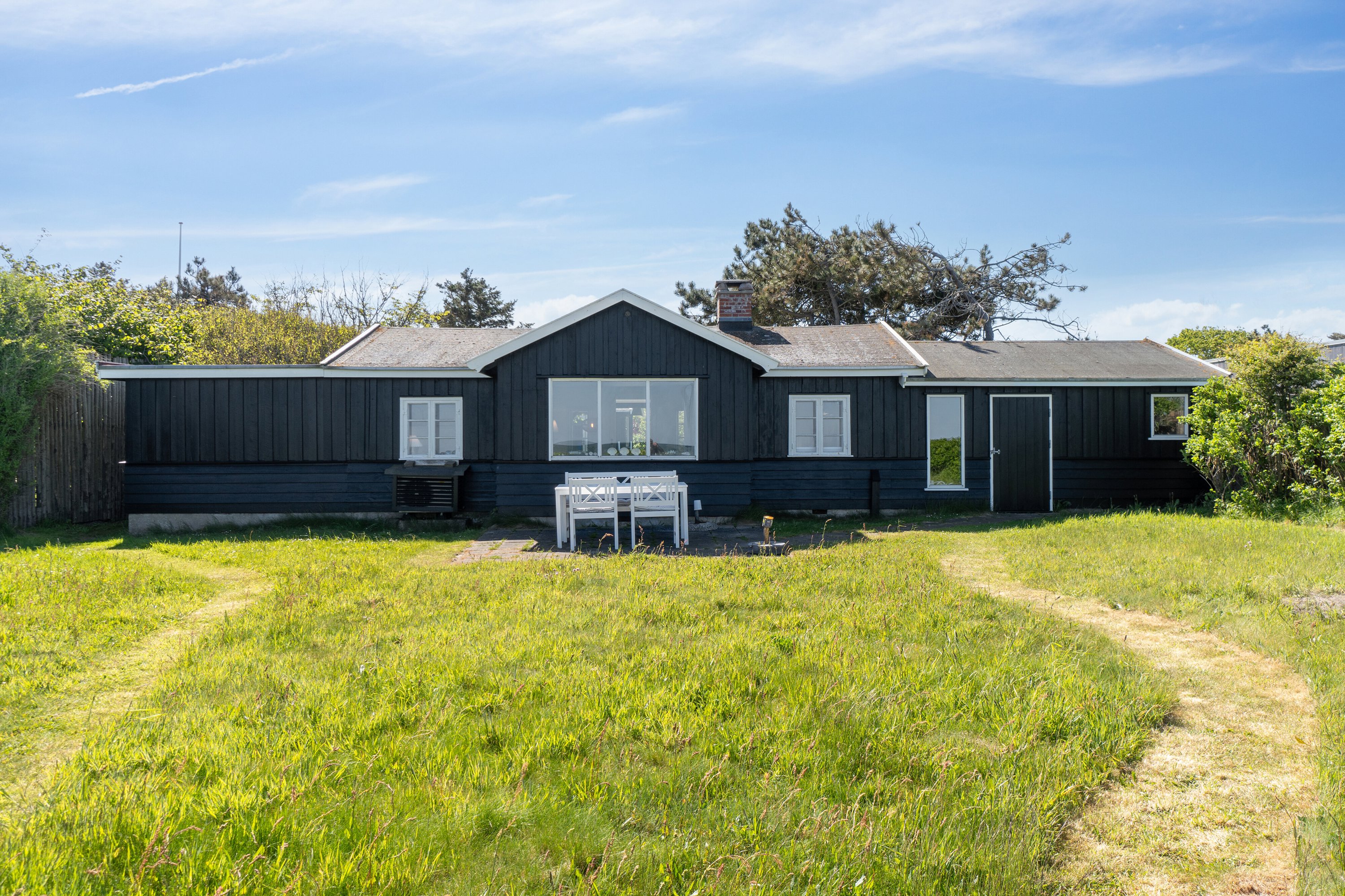 Fremhævet set fra haven billede i fuldskærmstilstand. Billede af Leck Fischersvej 6, Kikhavn, 3390 Hundested