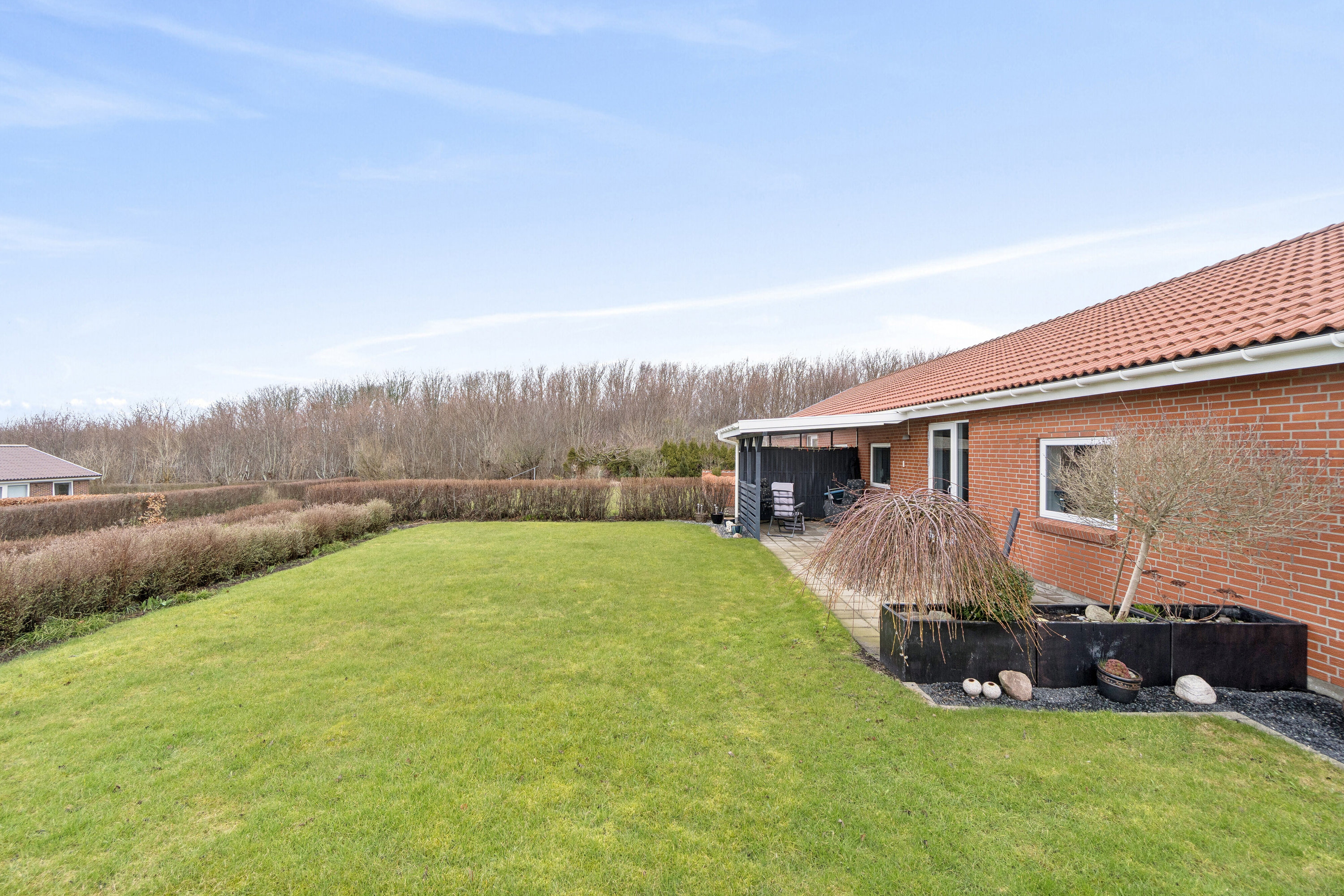 Fremhævet set fra haven billede i fuldskærmstilstand. Billede af Nørrevænge 45, 7700 Thisted