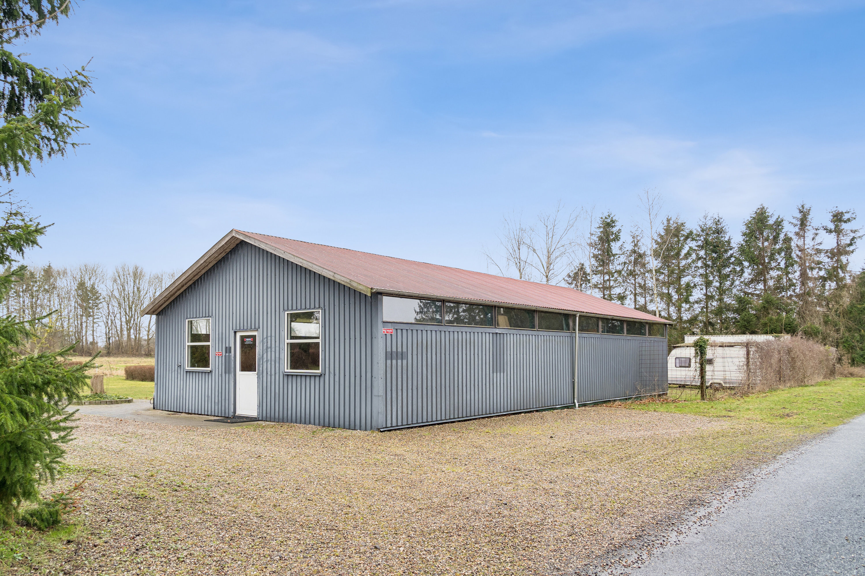 Fremhævet udendørs billede i fuldskærmstilstand. Billede af Vesterskovvej 1, Årslev Mark, 5792 Årslev