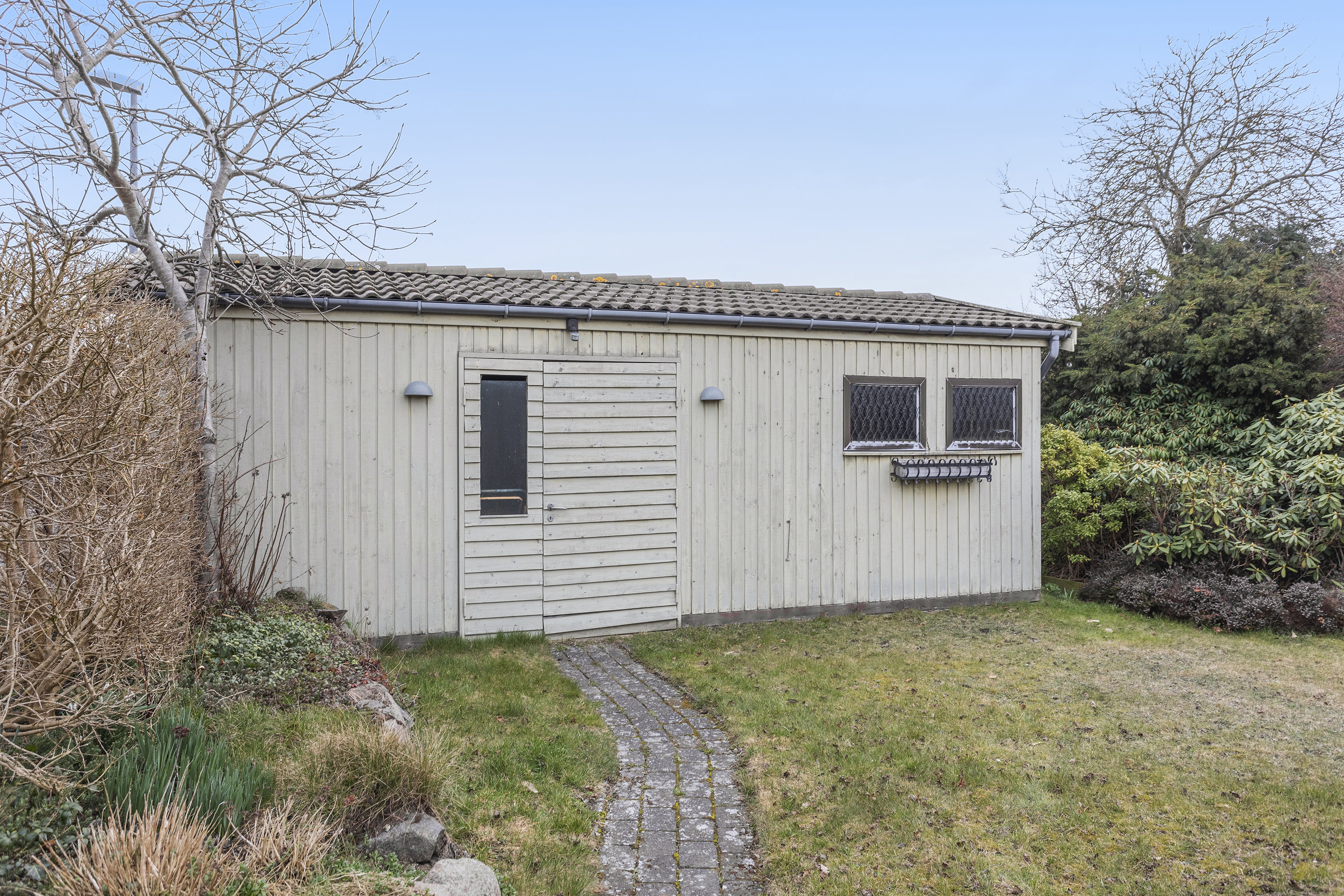 Fremhævet facade billede i fuldskærmstilstand. Billede af Flemløsevej 8, 2770 Kastrup