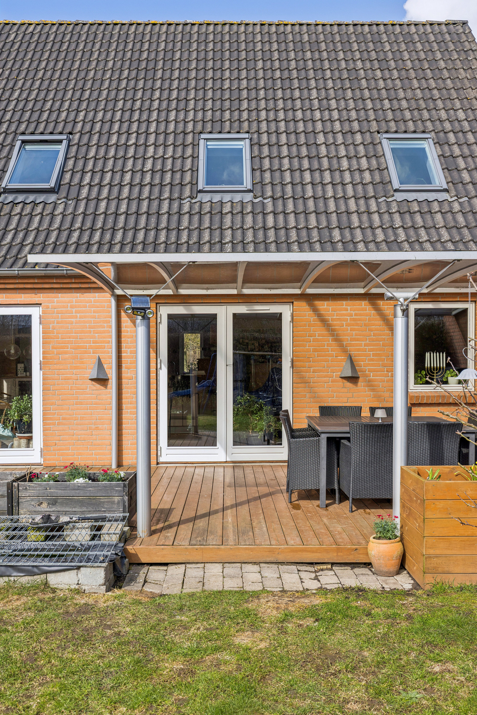 Fremhævet set fra haven billede i fuldskærmstilstand. Billede af Plantevej 49, Appenæs, 4700 Næstved