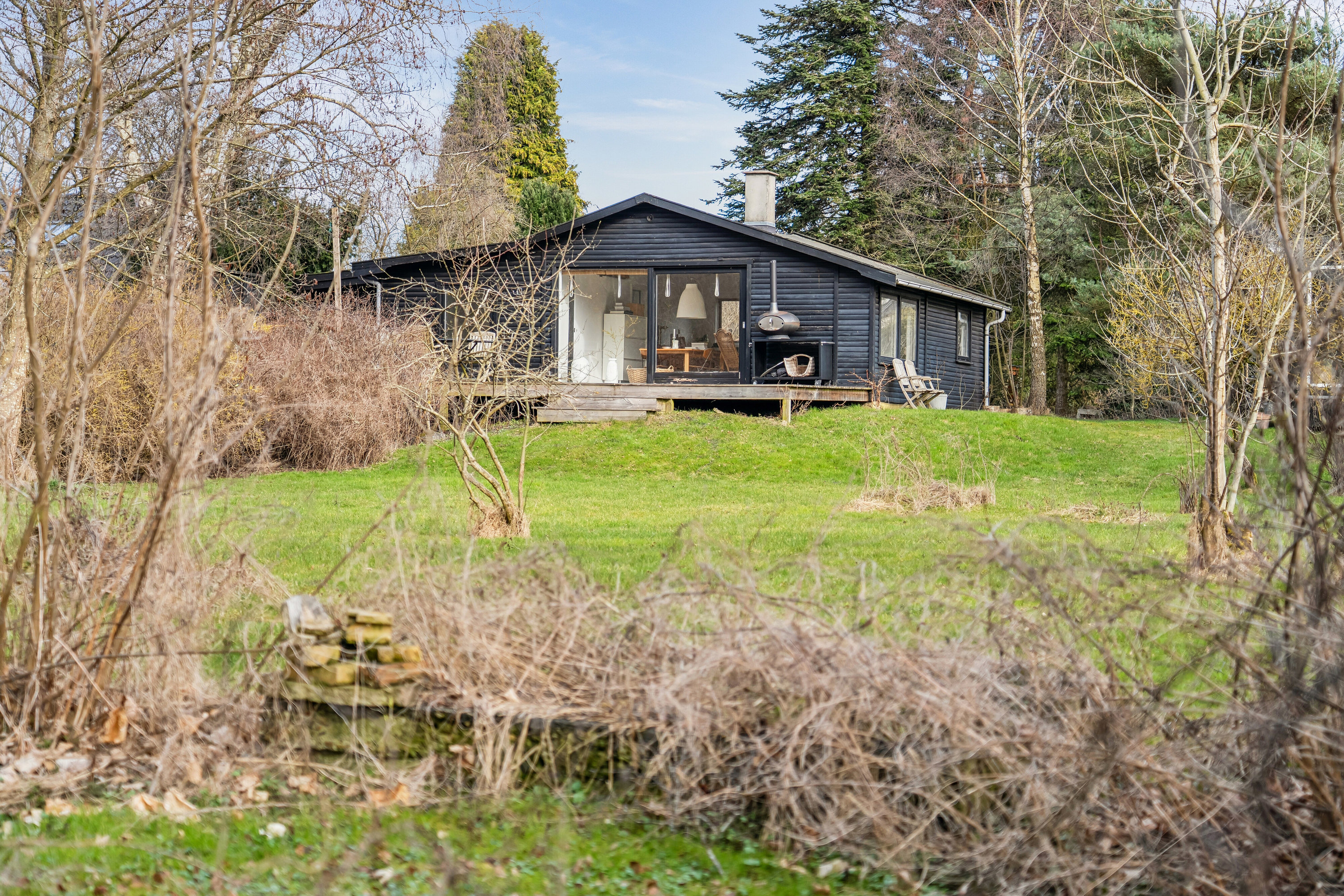 Fremhævet set fra haven billede i fuldskærmstilstand. Billede af Gl Havreholmvej 18, 3100 Hornbæk