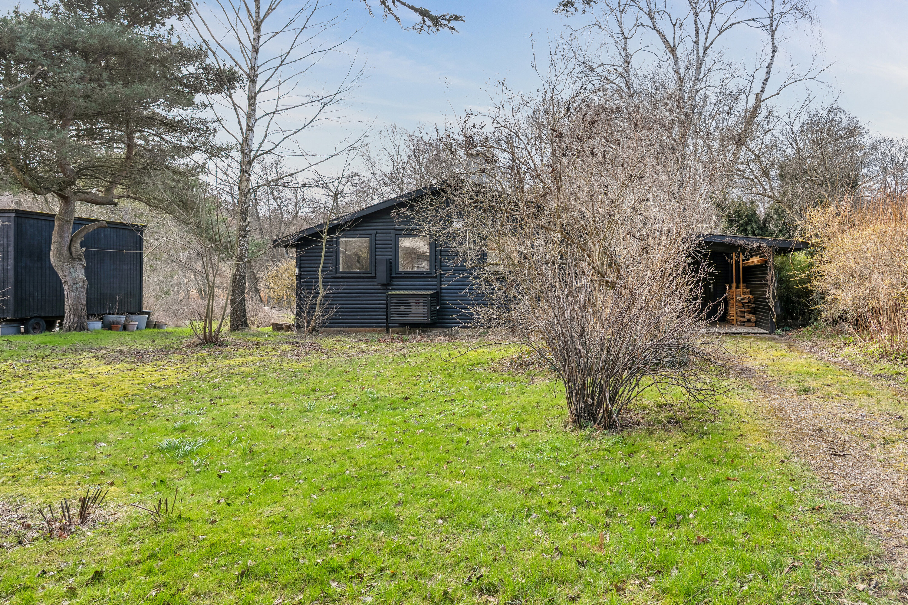 Fremhævet set fra haven billede i fuldskærmstilstand. Billede af Gl Havreholmvej 18, 3100 Hornbæk