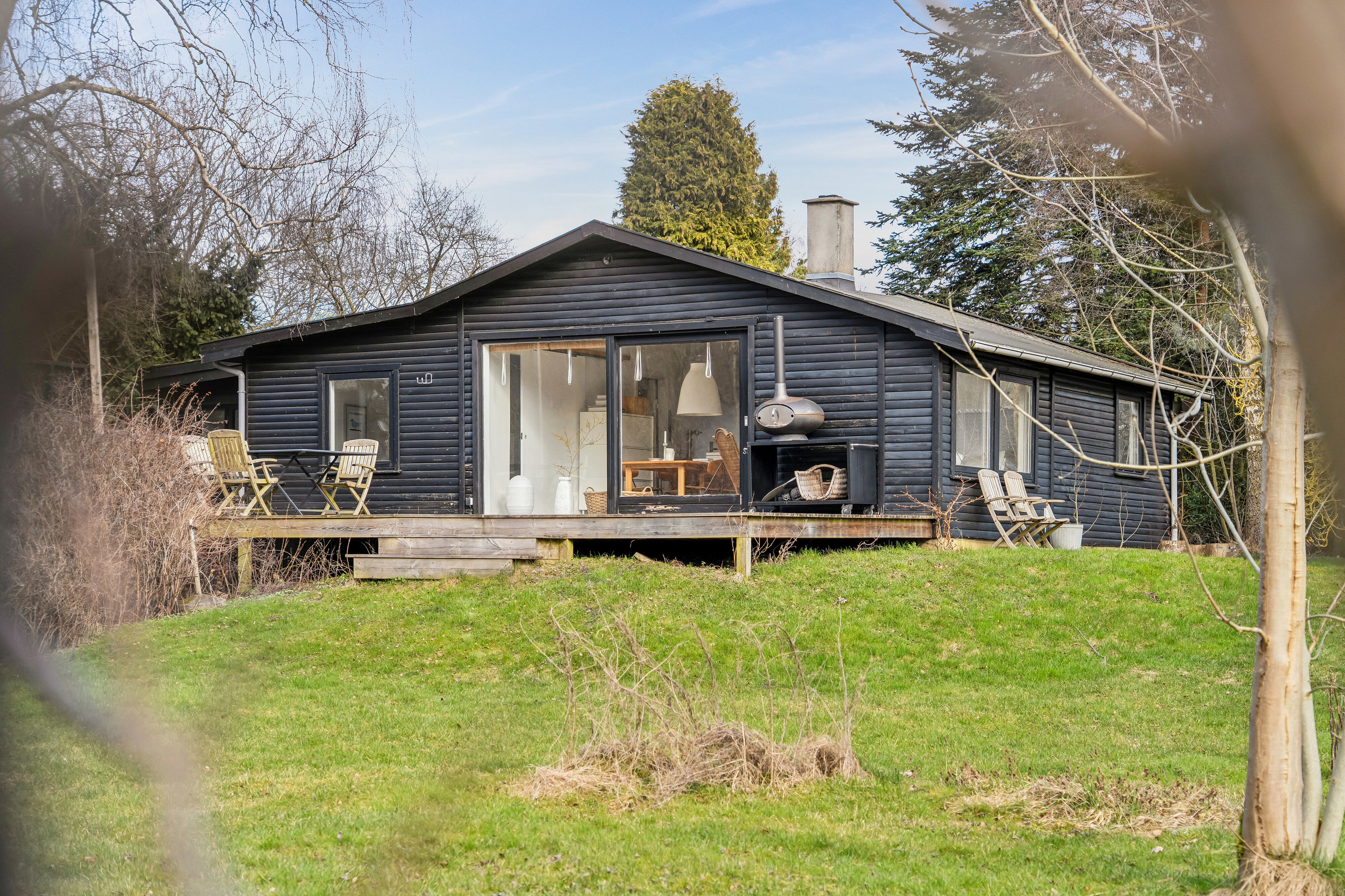 Fremhævet set fra haven billede i fuldskærmstilstand. Billede af Gl Havreholmvej 18, 3100 Hornbæk