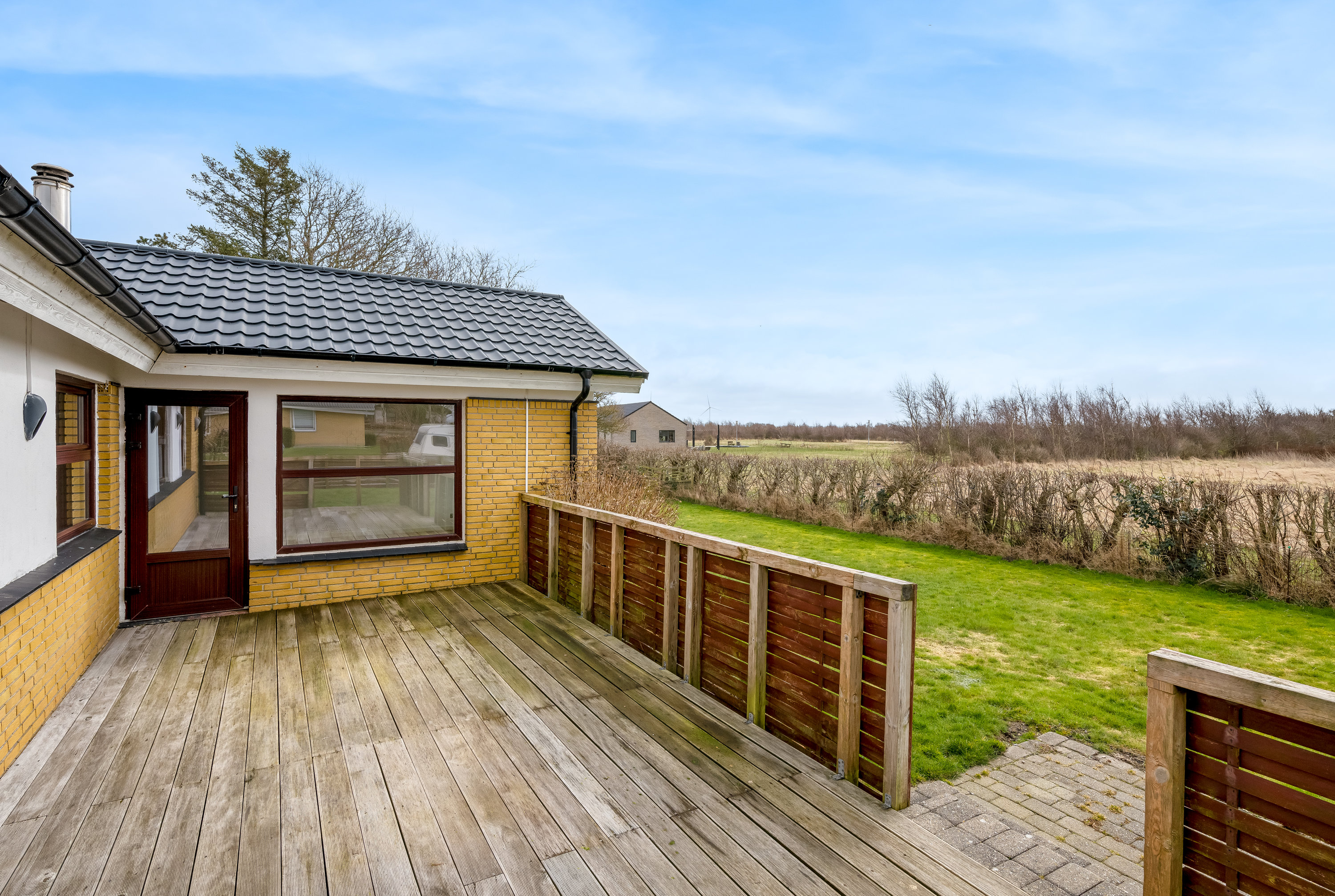 Fremhævet altan billede i fuldskærmstilstand. Billede af Velling Kirkeby 45, Velling, 6950 Ringkøbing