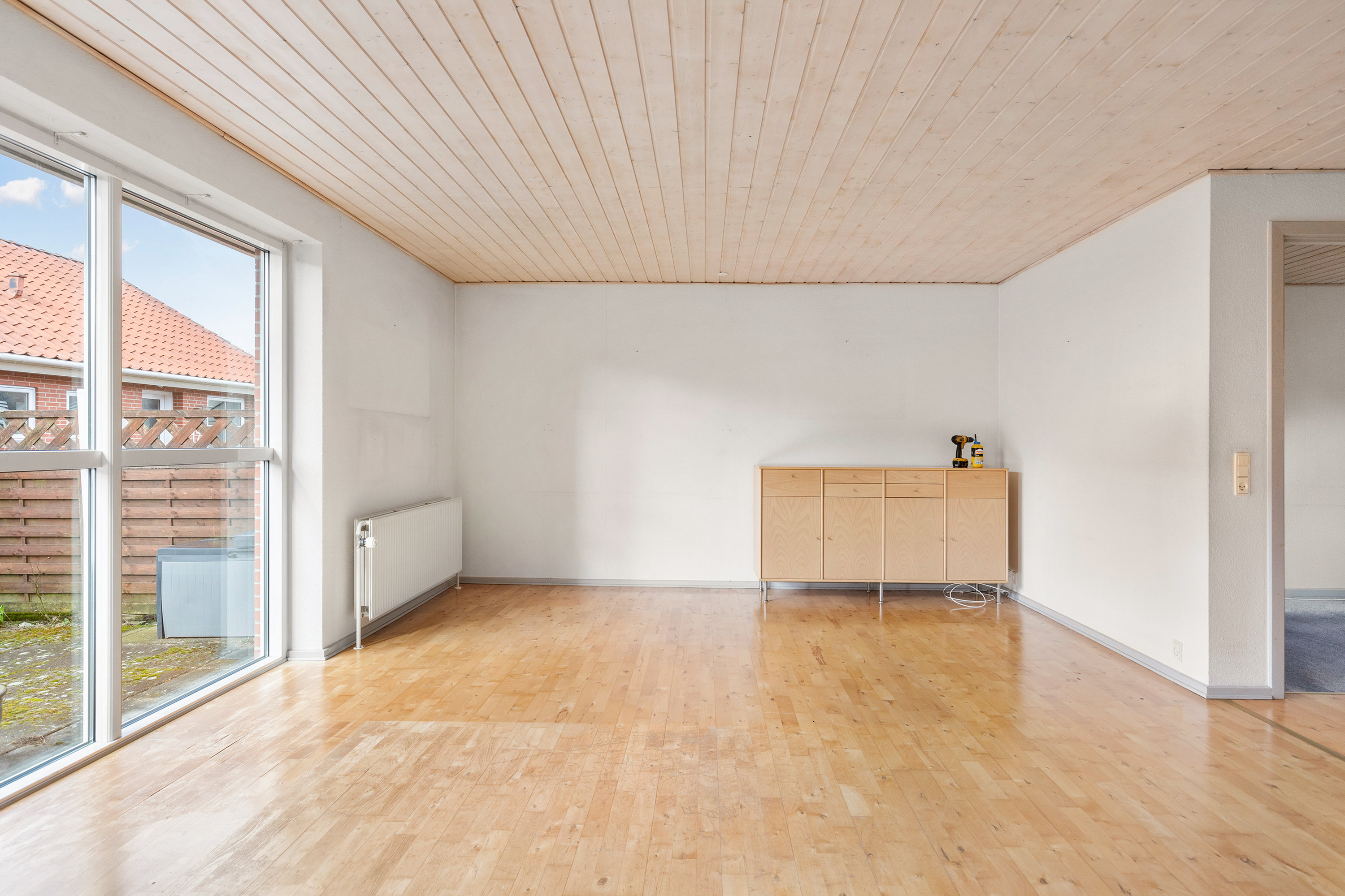 Fremhævet stue billede i fuldskærmstilstand. Billede af Åbredden 15, 9700 Brønderslev