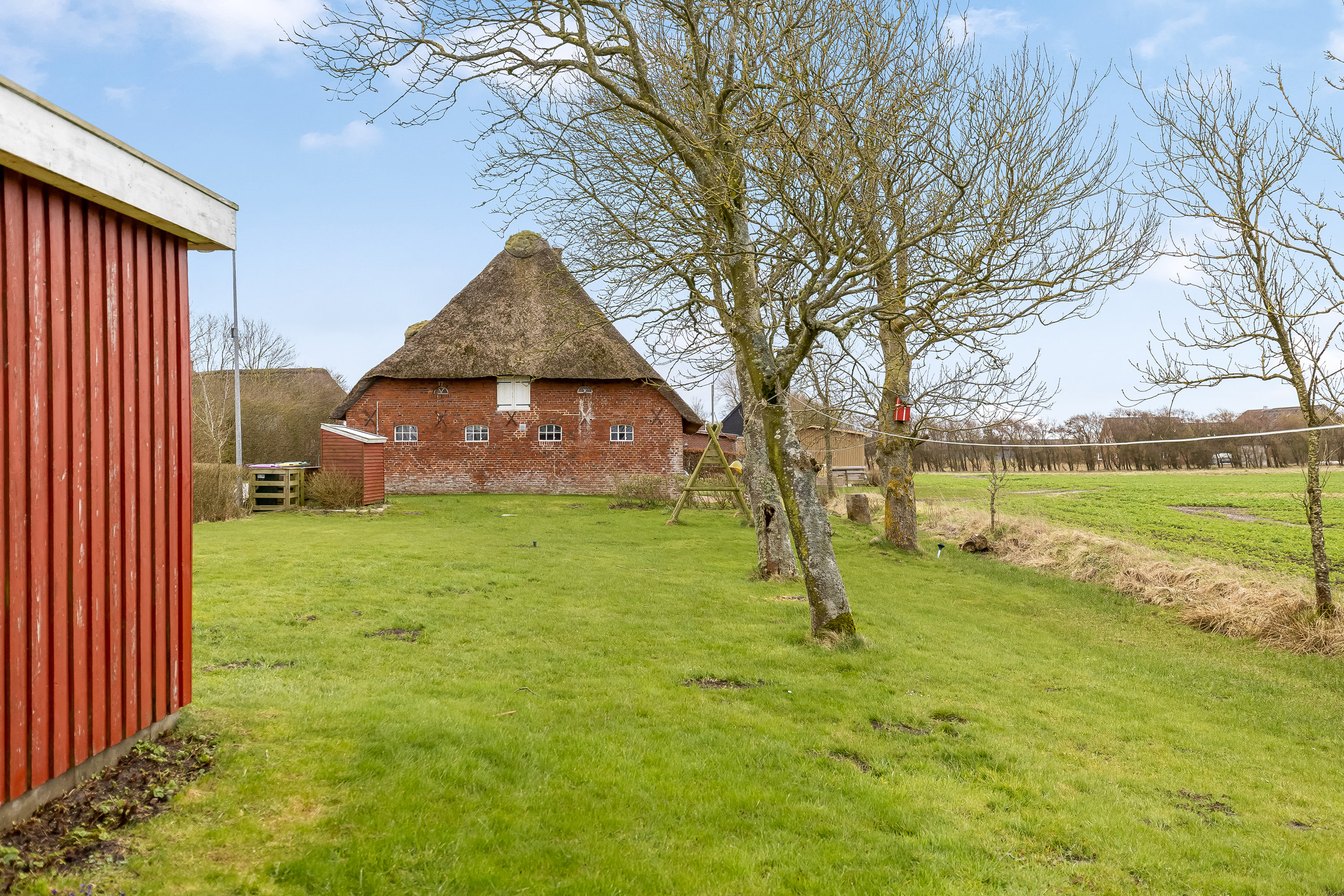 Fremhævet facade billede i fuldskærmstilstand. Billede af Rudbølvej 2, 6280 Højer