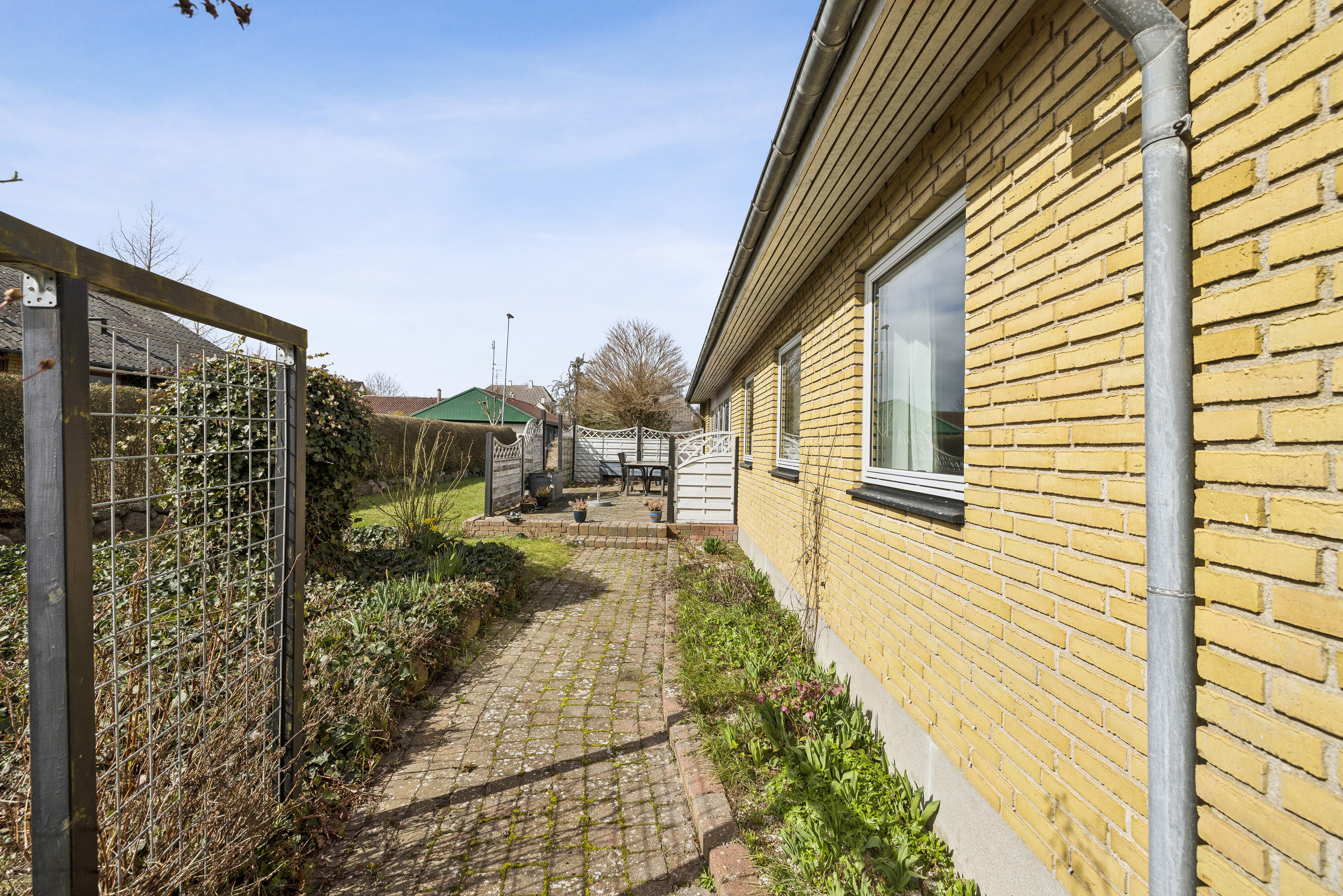 Fremhævet set fra haven billede i fuldskærmstilstand. Billede af Lønkildevej 5, Lindelse, 5900 Rudkøbing