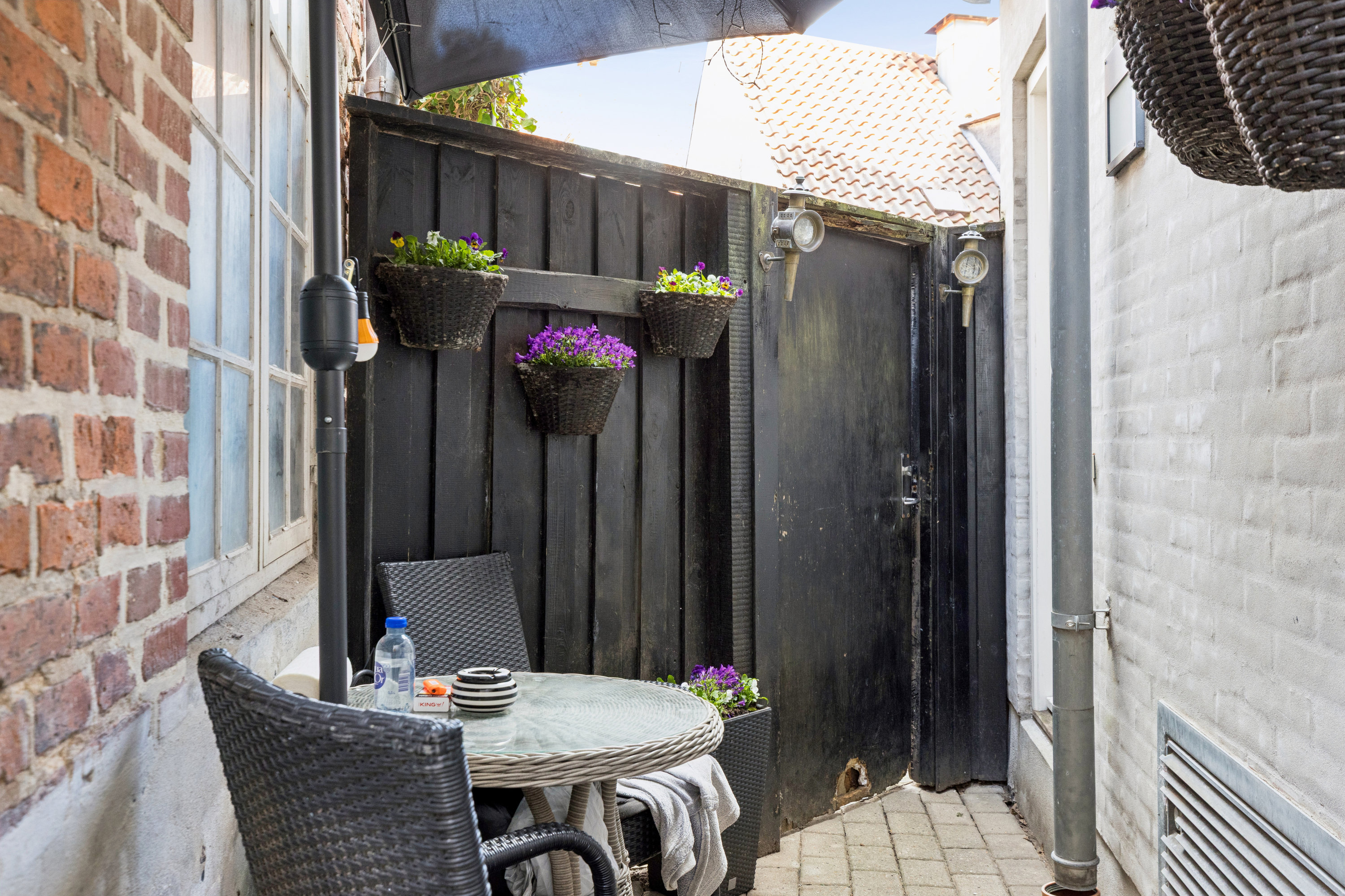 Fremhævet altan billede i fuldskærmstilstand. Billede af Torvet 10, 6760 Ribe