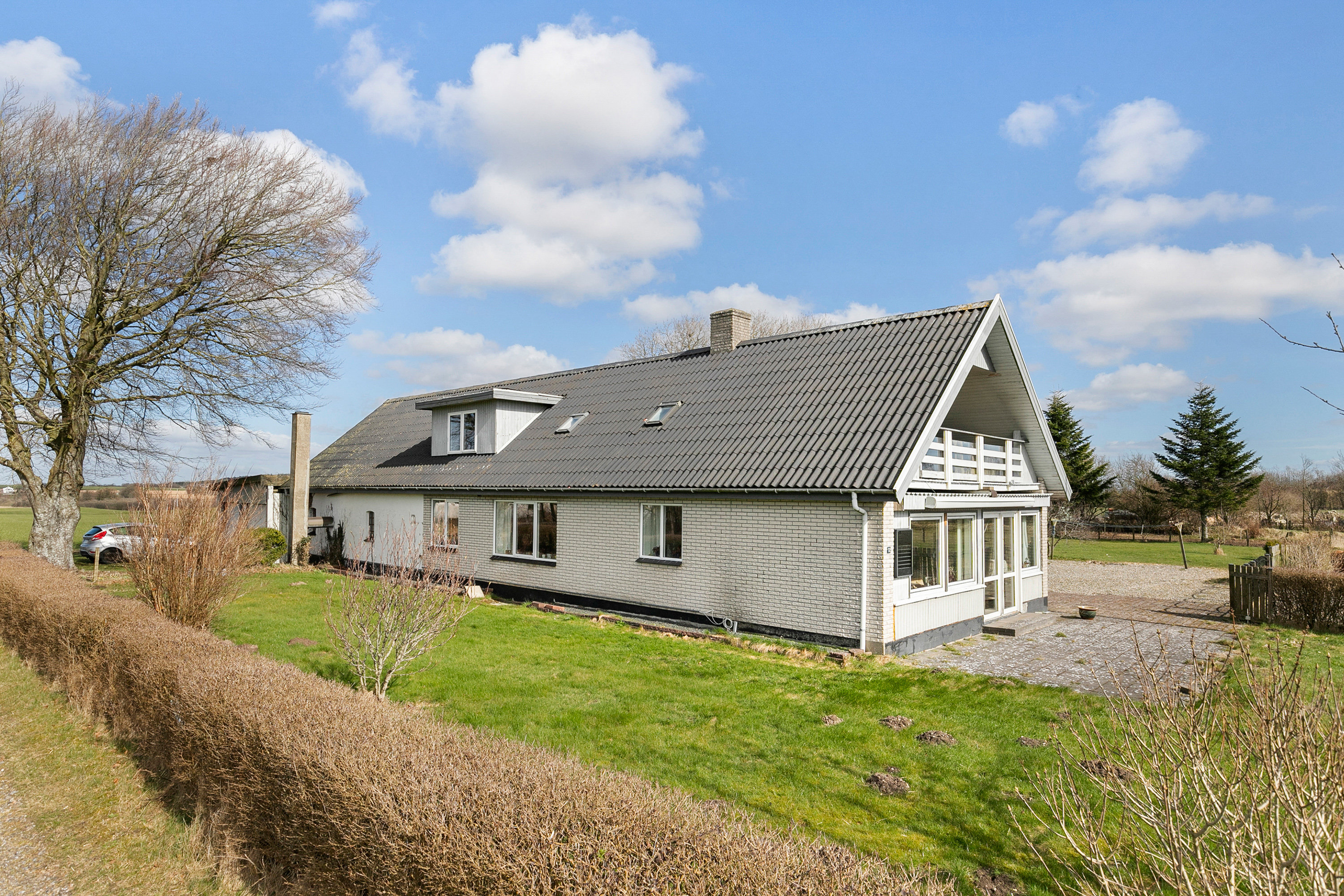 Fremhævet facade billede i fuldskærmstilstand. Billede af Gunderupvej 32, Tandrup, 9640 Farsø