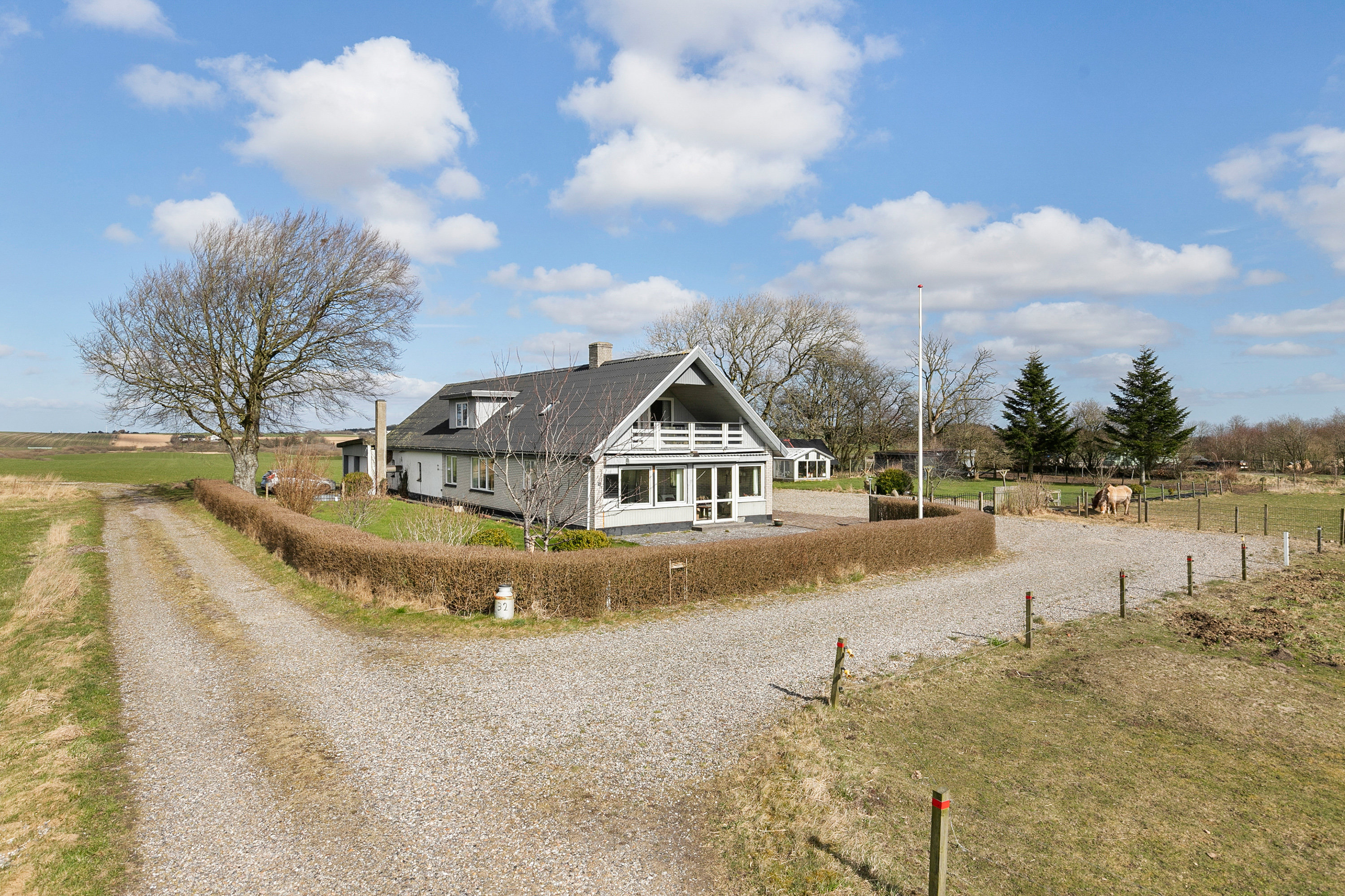 Fremhævet facade billede i fuldskærmstilstand. Billede af Gunderupvej 32, Tandrup, 9640 Farsø