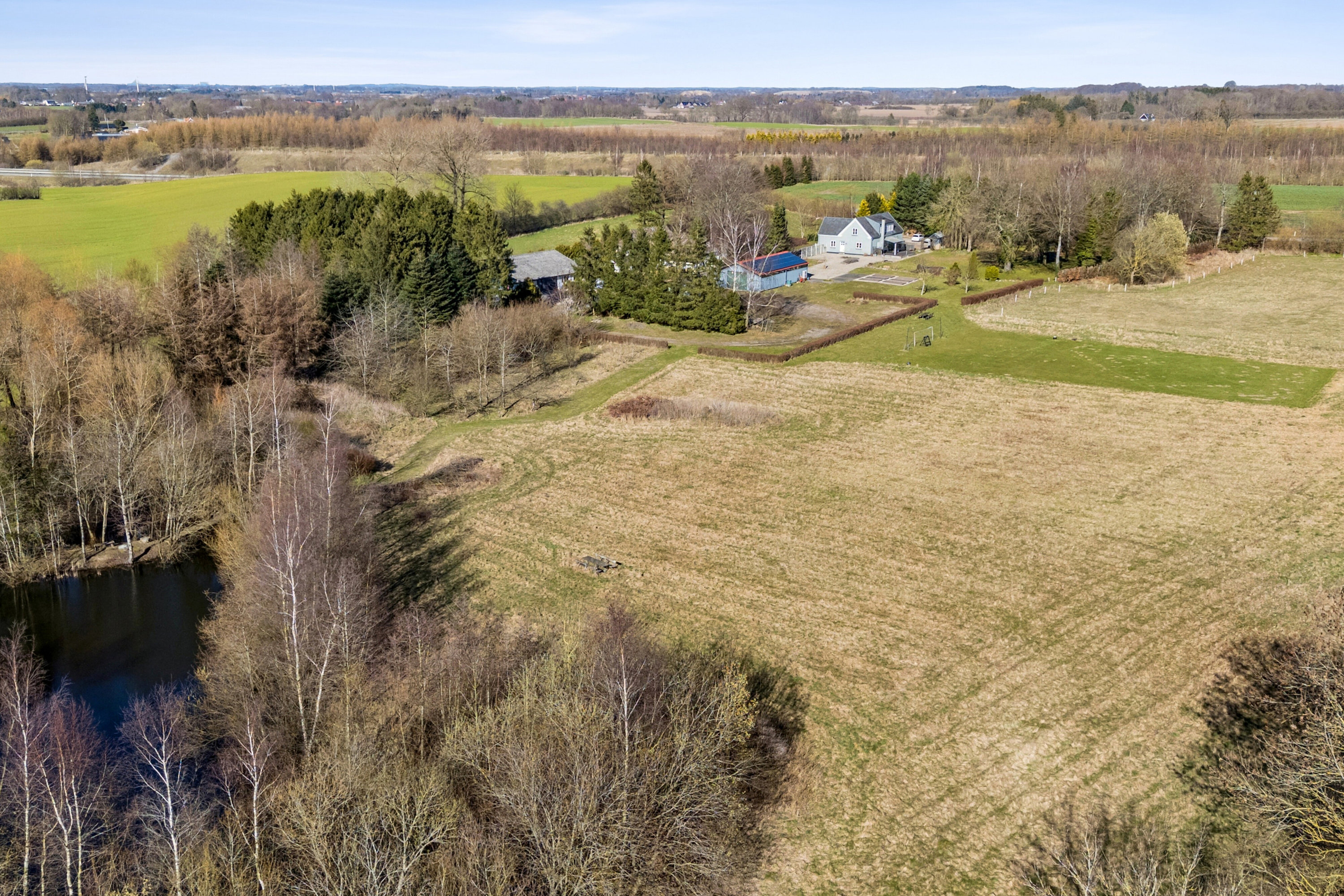 Fremhævet udendørs billede i fuldskærmstilstand. Billede af Vesterskovvej 1, Årslev Mark, 5792 Årslev