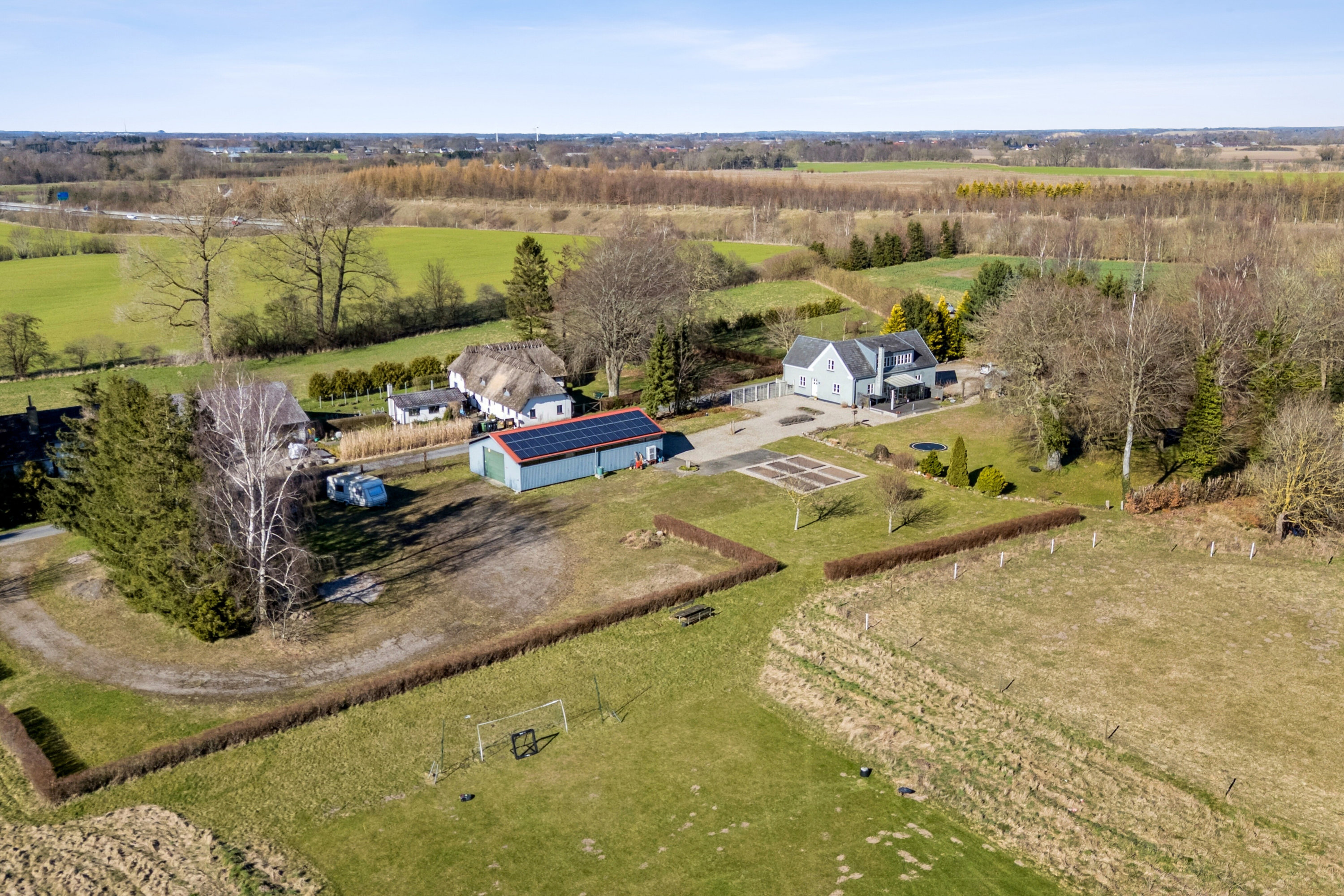 Fremhævet udendørs billede i fuldskærmstilstand. Billede af Vesterskovvej 1, Årslev Mark, 5792 Årslev