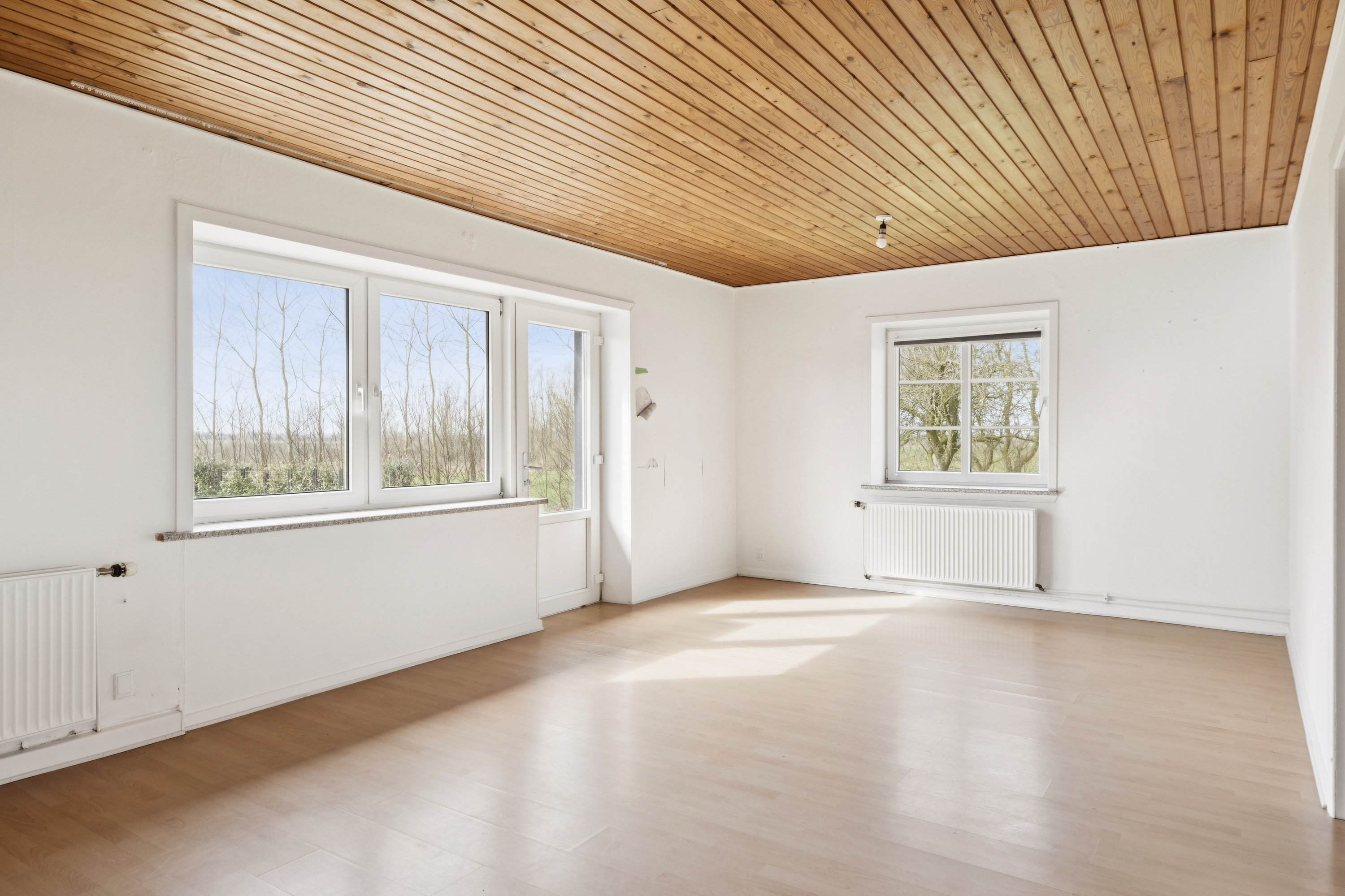 Fremhævet stue billede i fuldskærmstilstand. Billede af Roagervej 396A, Kirkeby, 6760 Ribe