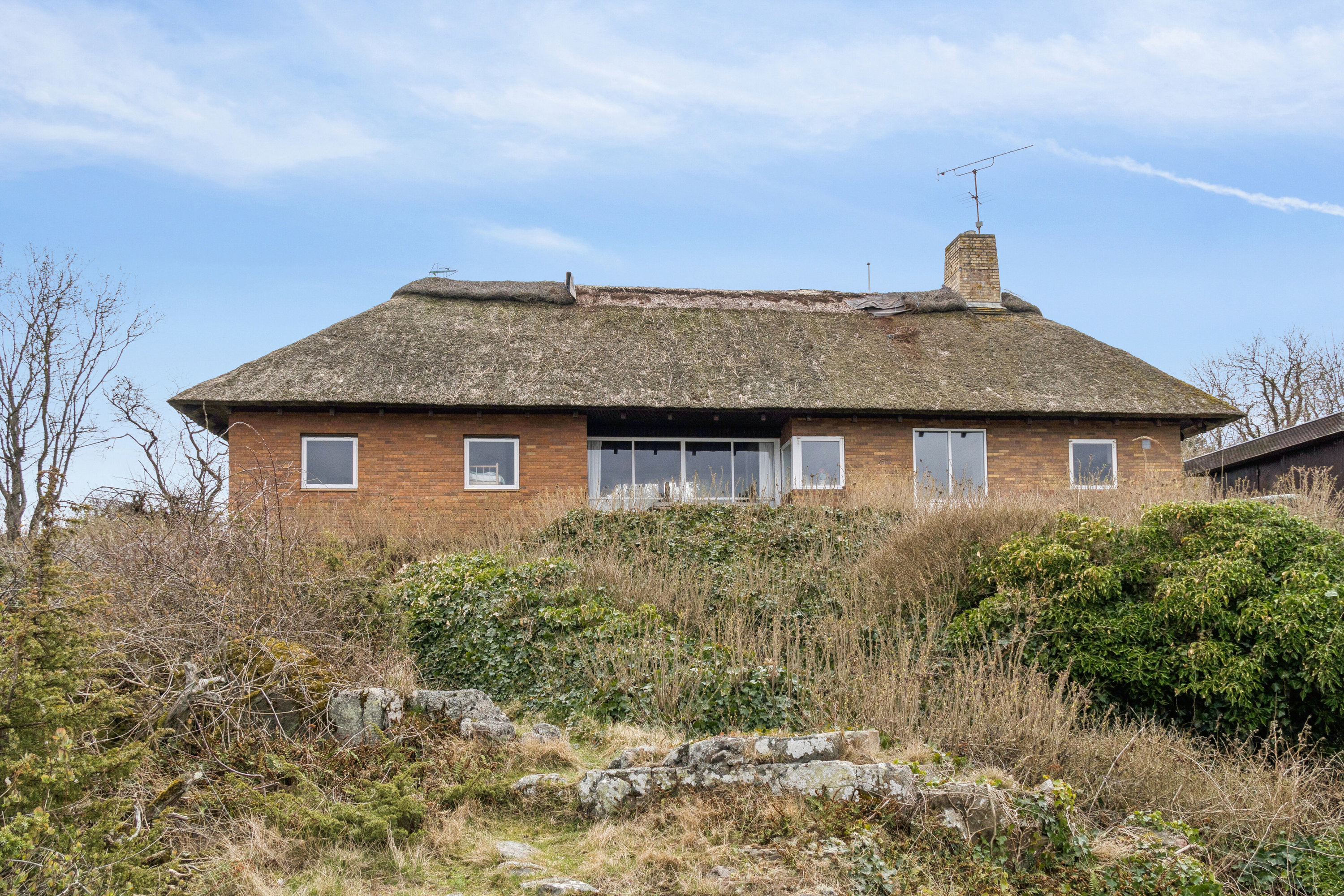 Fremhævet set fra haven billede i fuldskærmstilstand. Billede af Randkløvevej 48, Østermarie, 3760 Gudhjem