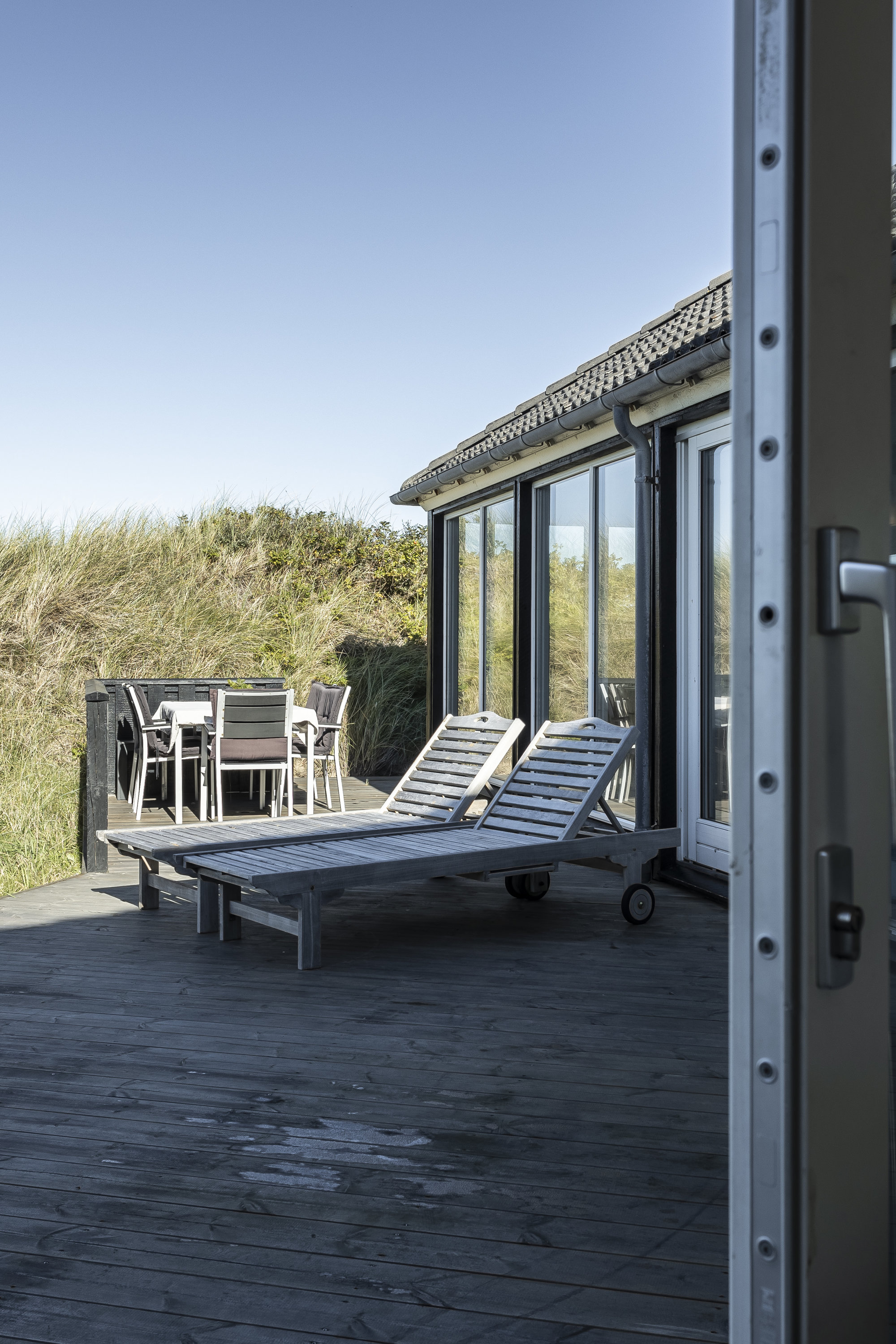 Fremhævet udgang til terrasse billede i fuldskærmstilstand. Billede af Ingeborghusvej 4, Tornby, 9850 Hirtshals