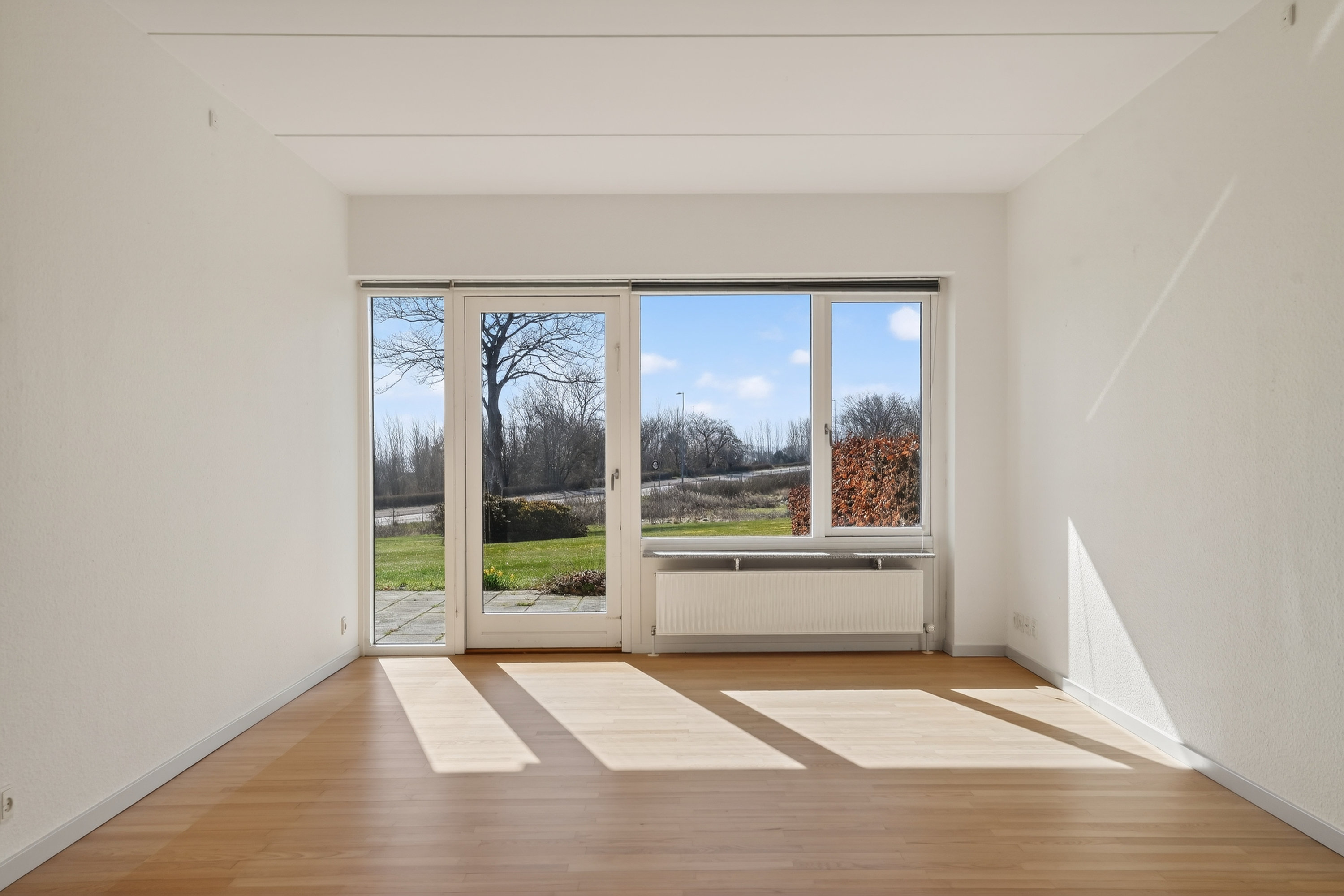 Fremhævet stue billede i fuldskærmstilstand. Billede af Annebergparken 4, st.. 45., 4500 Nykøbing Sj