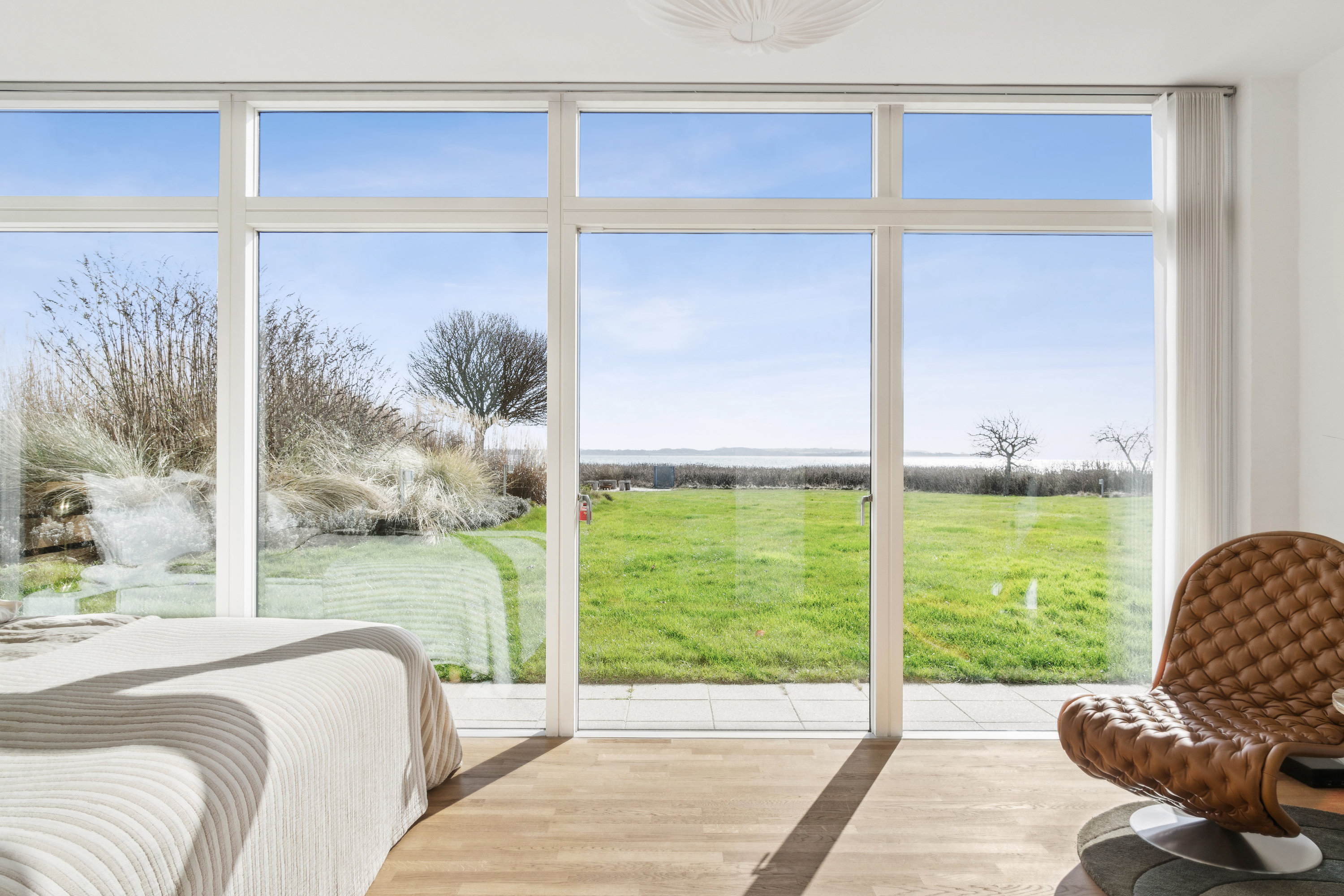 Fremhævet udestue billede i fuldskærmstilstand. Billede af Skæring Strandvej 64, 8250 Egå