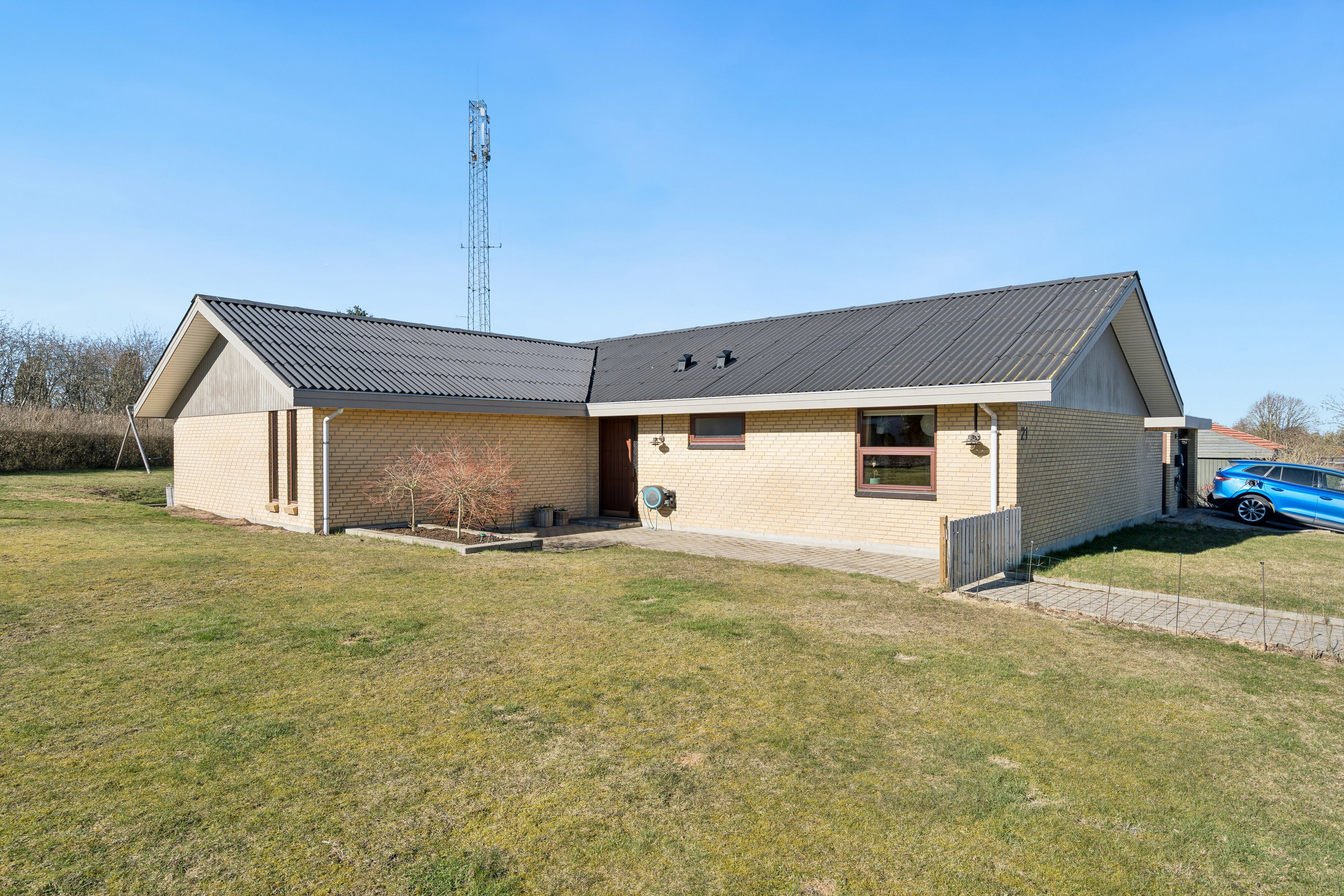 Fremhævet set fra haven billede i fuldskærmstilstand. Billede af Frejasvej 21, 9870 Sindal