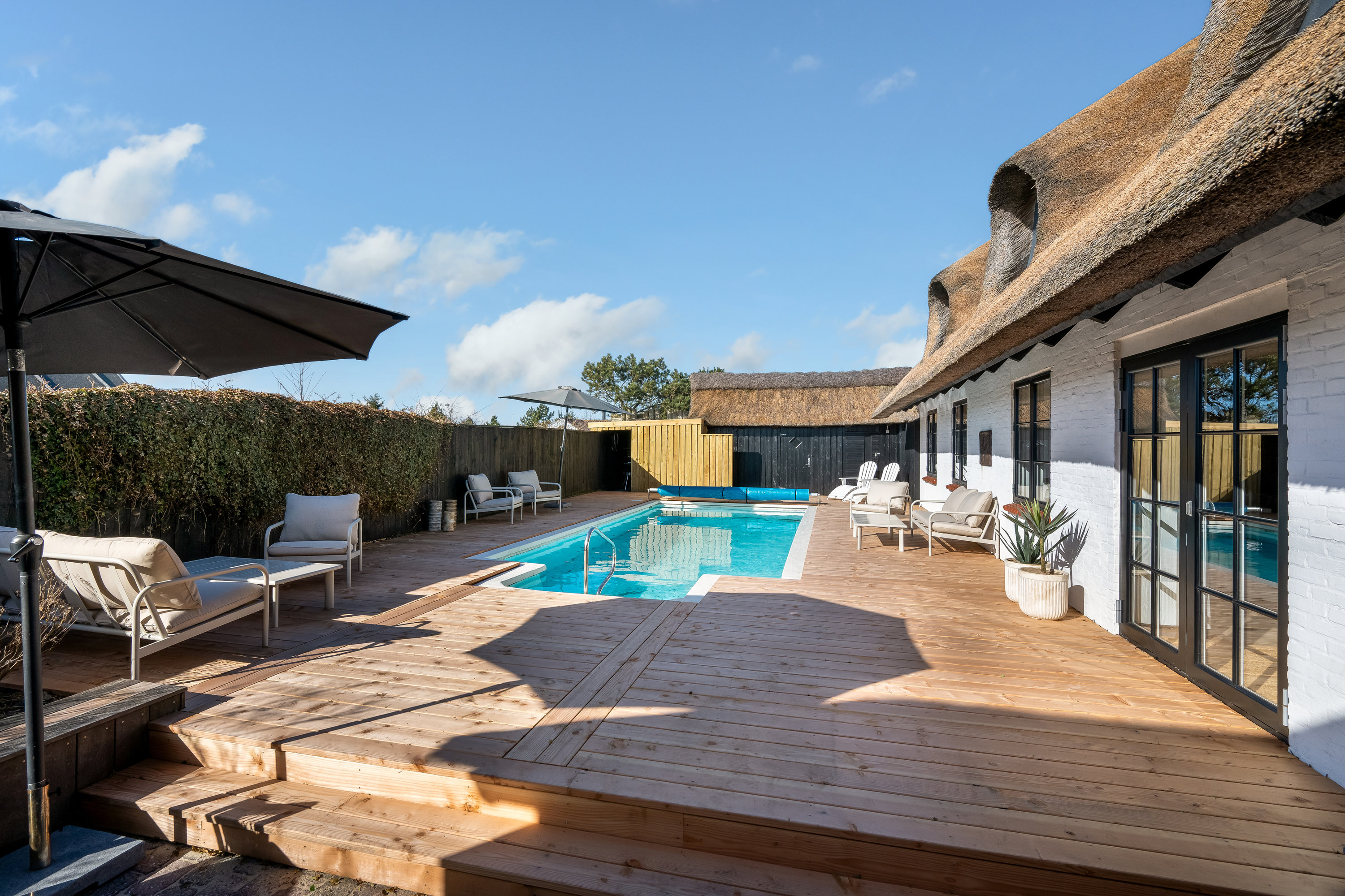 Fremhævet facade billede i fuldskærmstilstand. Billede af Lyngvig Havnevej 40, Nr Lyngvig, 6960 Hvide Sande