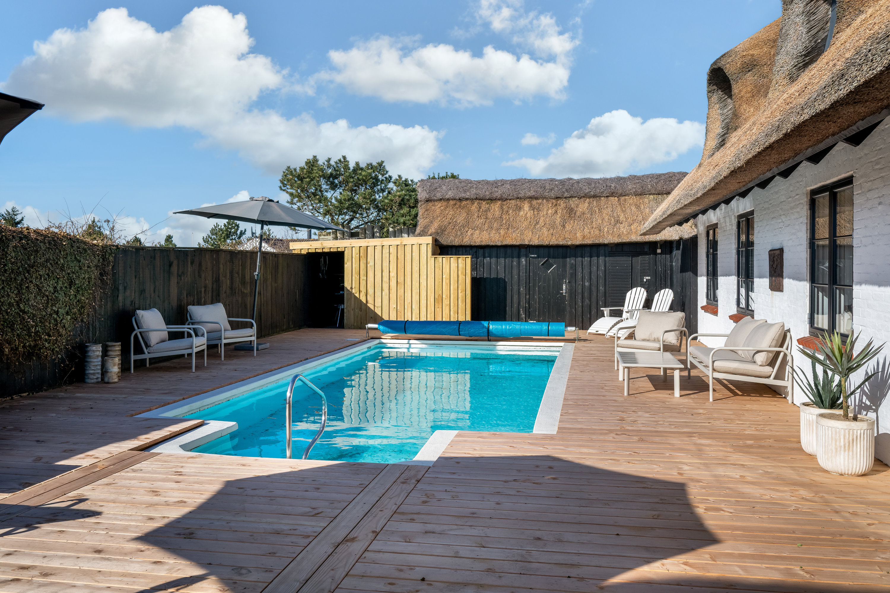 Fremhævet facade billede i fuldskærmstilstand. Billede af Lyngvig Havnevej 40, Nr Lyngvig, 6960 Hvide Sande