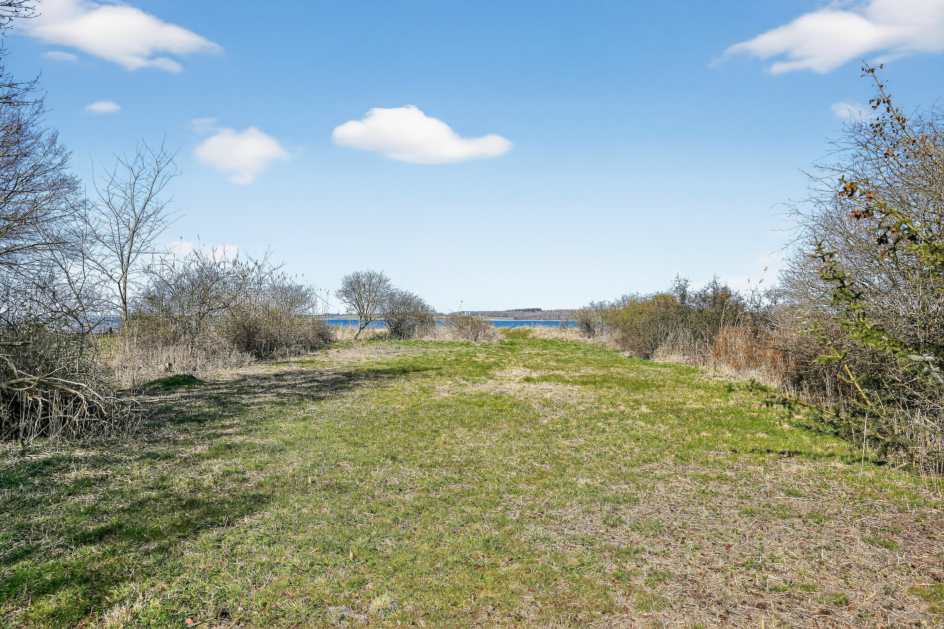 Fremhævet grund billede i fuldskærmstilstand. Billede af Kisserup Strand Vest 38, Kisserup, 4300 Holbæk