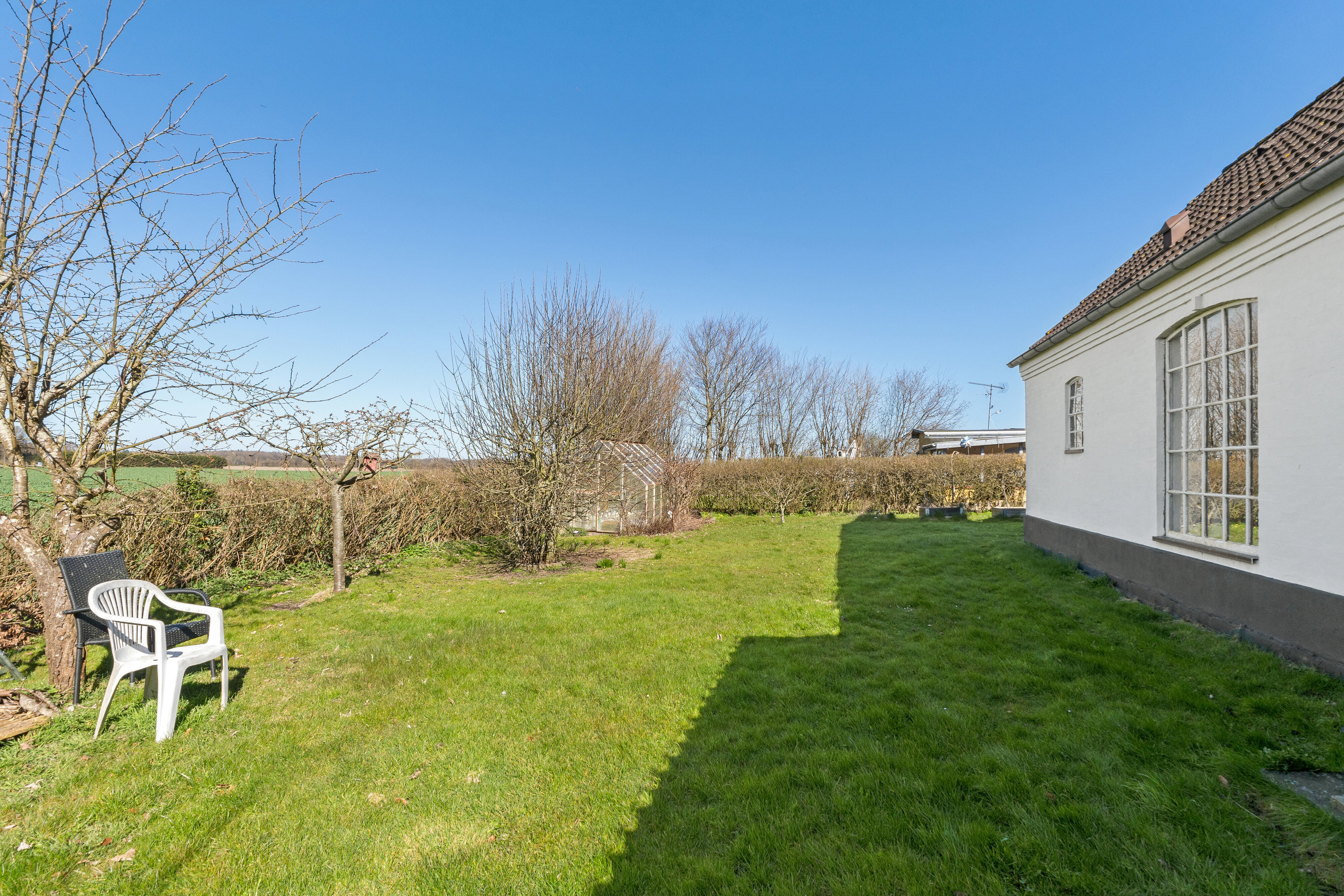 Fremhævet set fra haven billede i fuldskærmstilstand. Billede af Odensevej 65, Herrested, 5853 Ørbæk