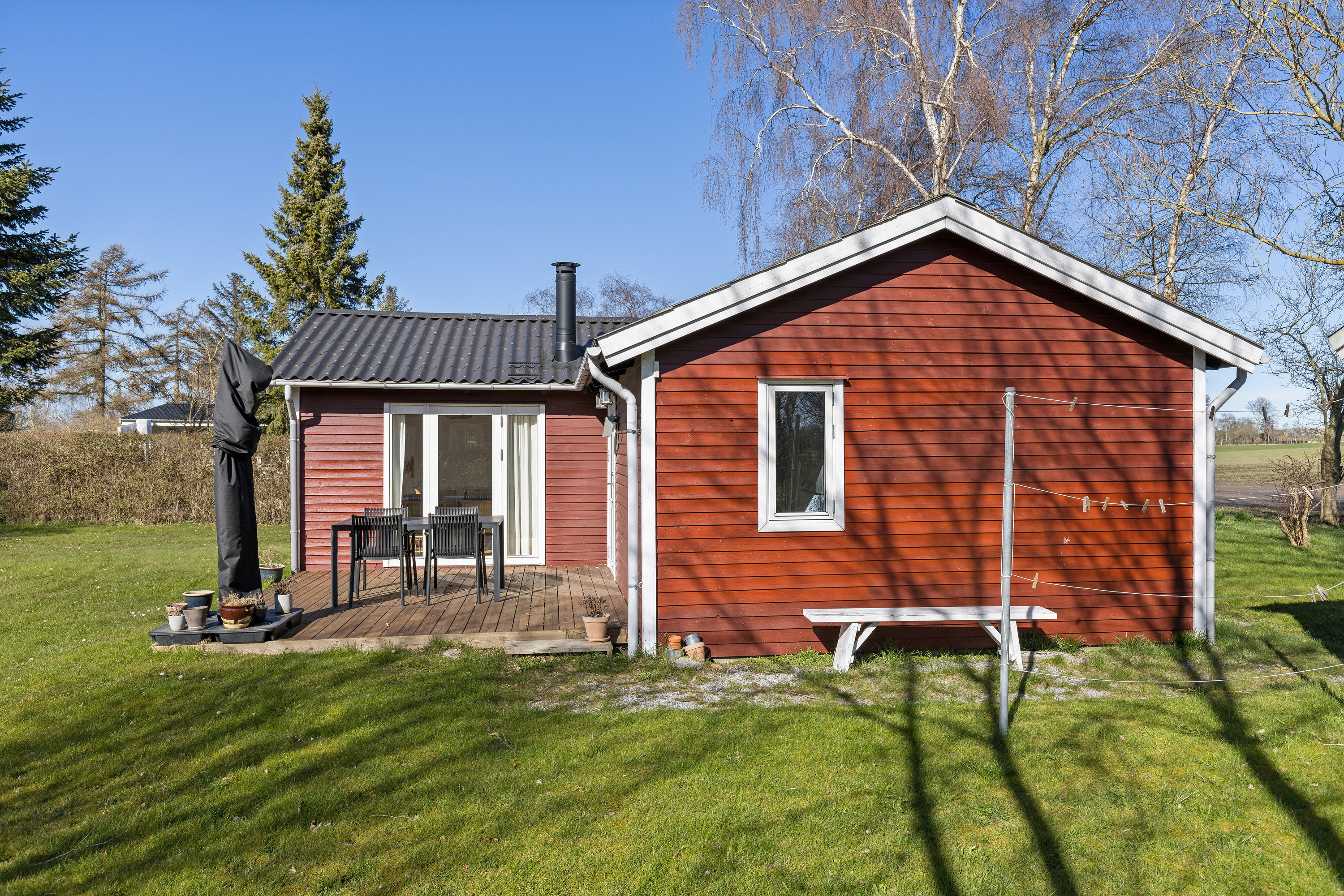 Fremhævet set fra haven billede i fuldskærmstilstand. Billede af Mindevej 16, Dalby Strand, 4281 Gørlev