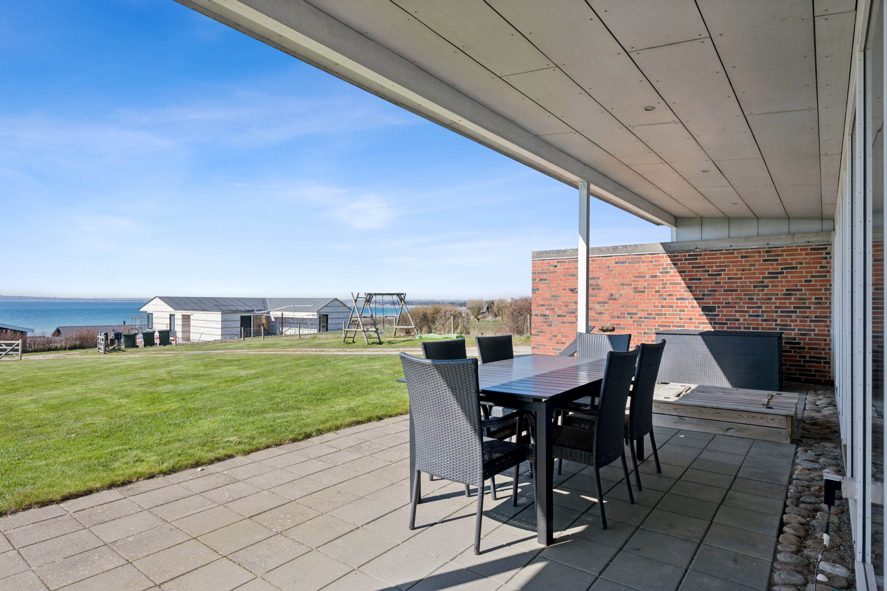 Fremhævet terrasse billede i fuldskærmstilstand. Billede af Solbakken 21, Skødshoved Bro, 8420 Knebel