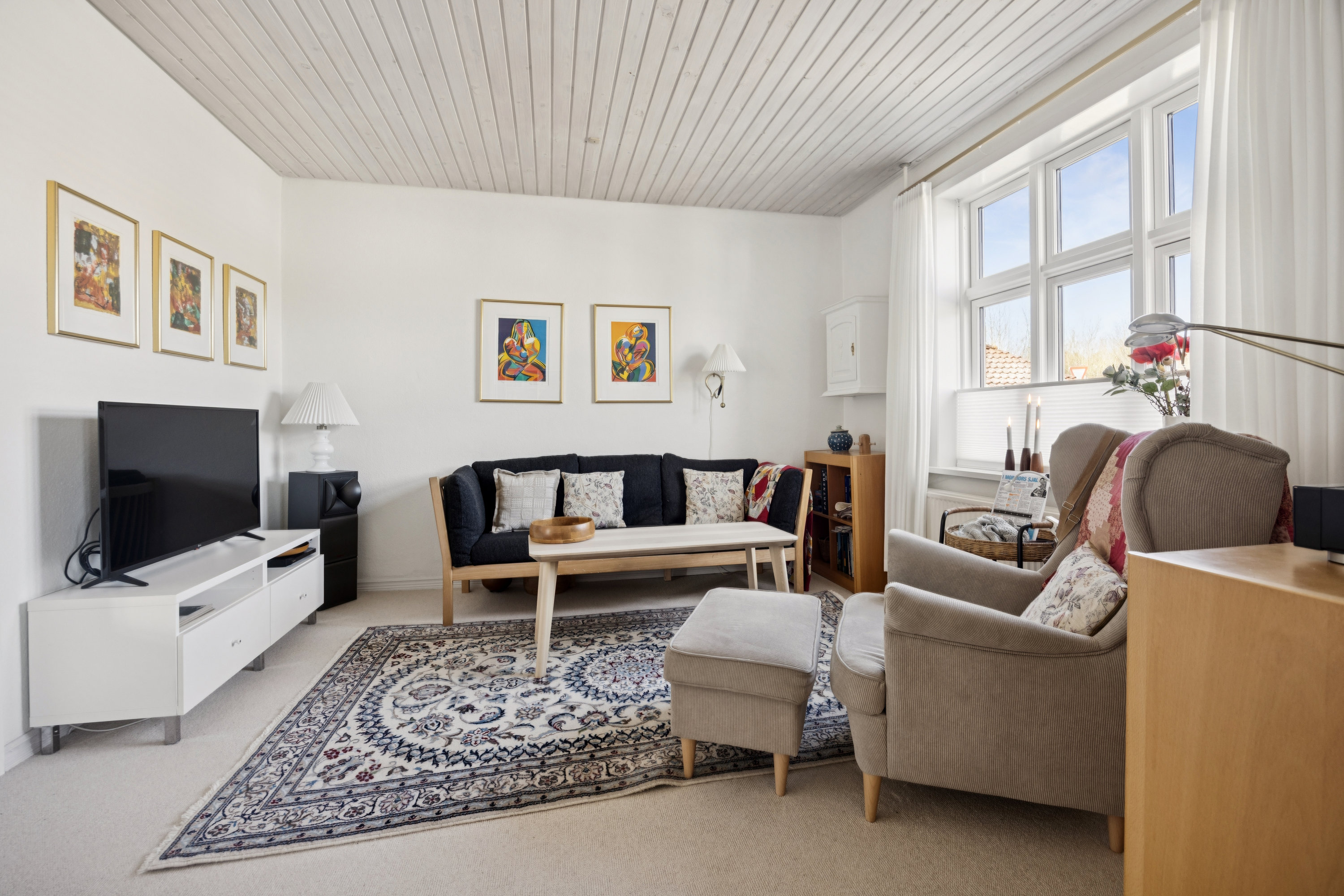 Fremhævet stue billede i fuldskærmstilstand. Billede af Røgildsvej 23, 9400 Nørresundby