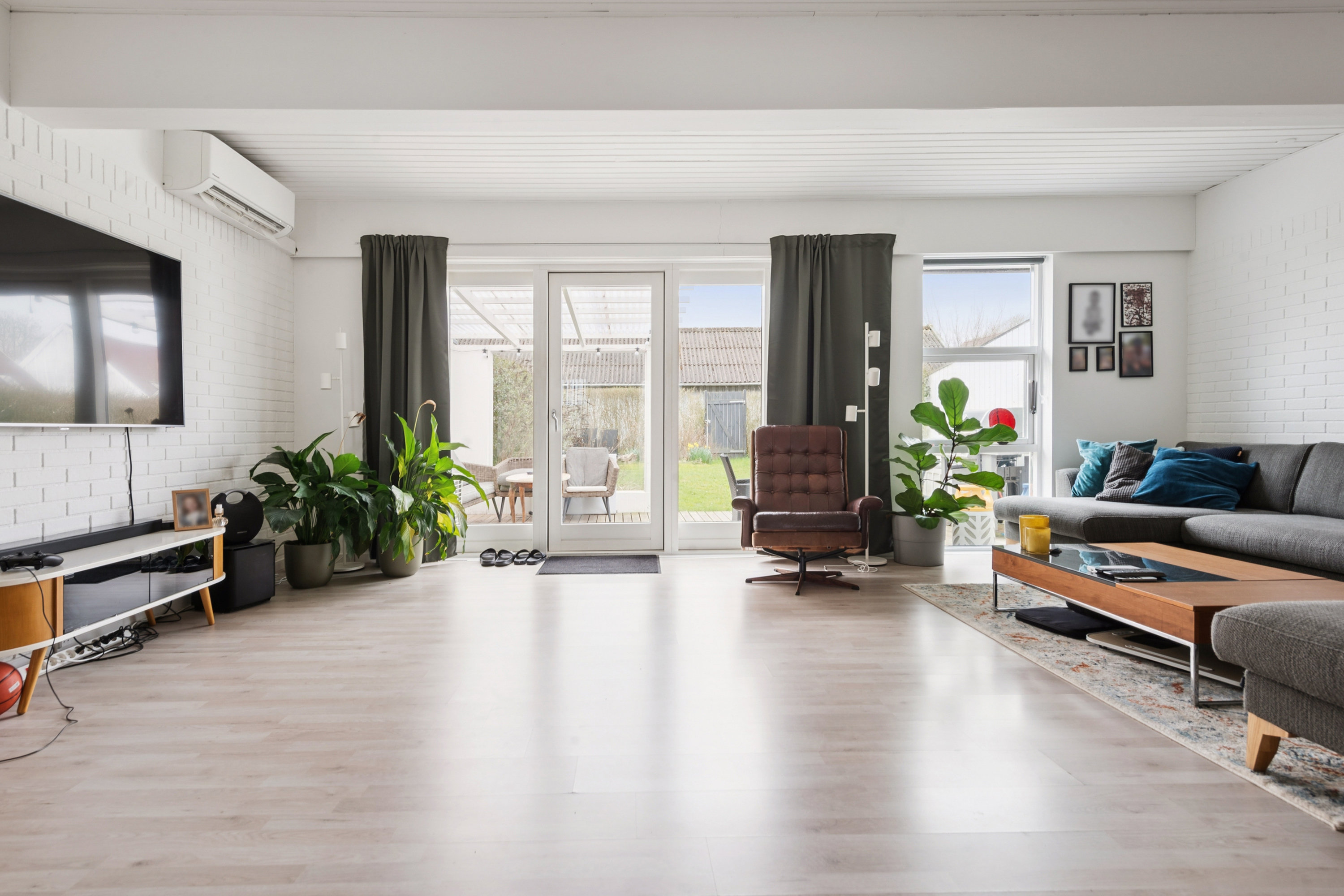 Fremhævet stue billede i fuldskærmstilstand. Billede af Lundegårdsparken 22, 4030 Tune