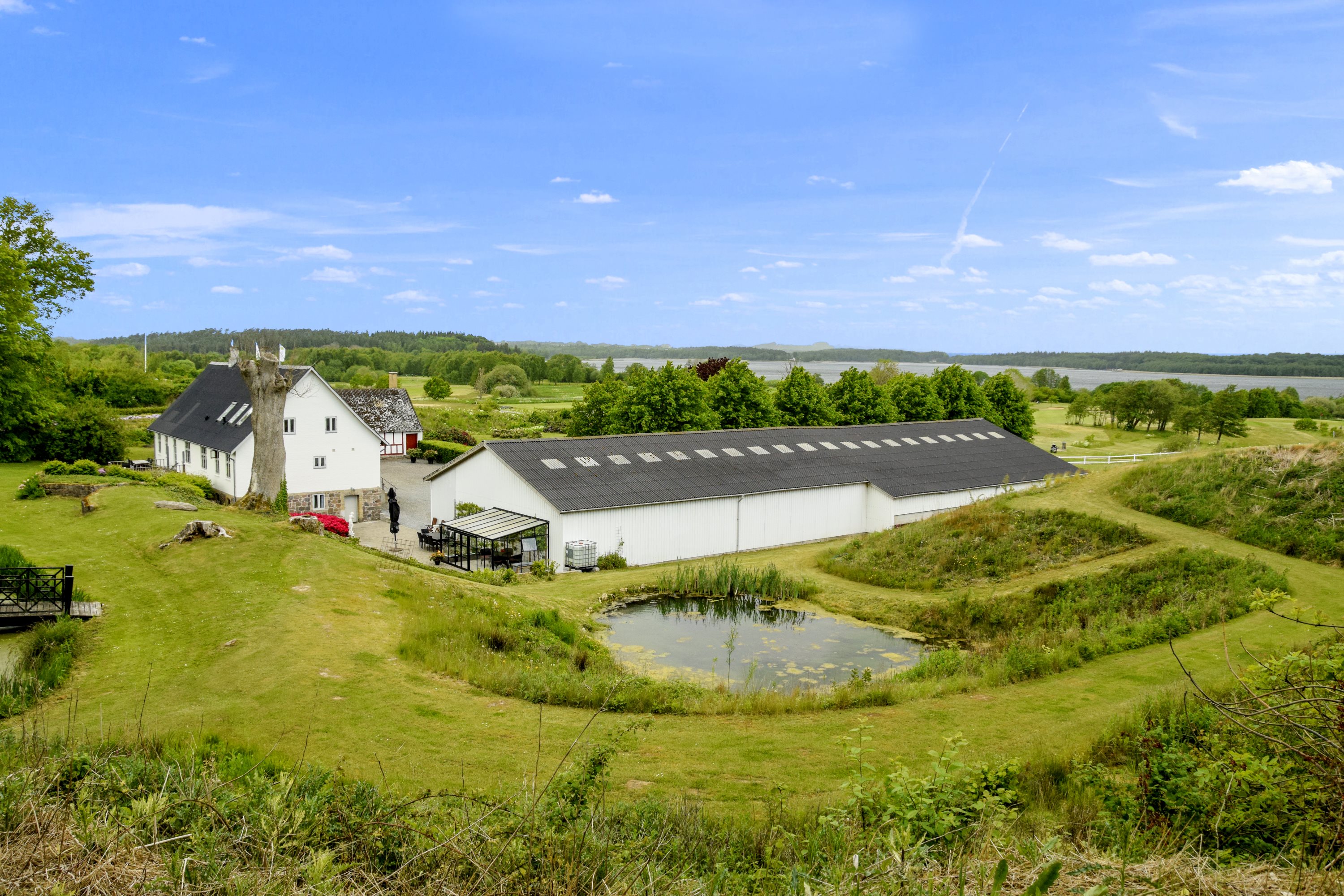 Fremhævet luftfoto billede i fuldskærmstilstand. Billede af Hylke Møllevej 4, 8660 Skanderborg